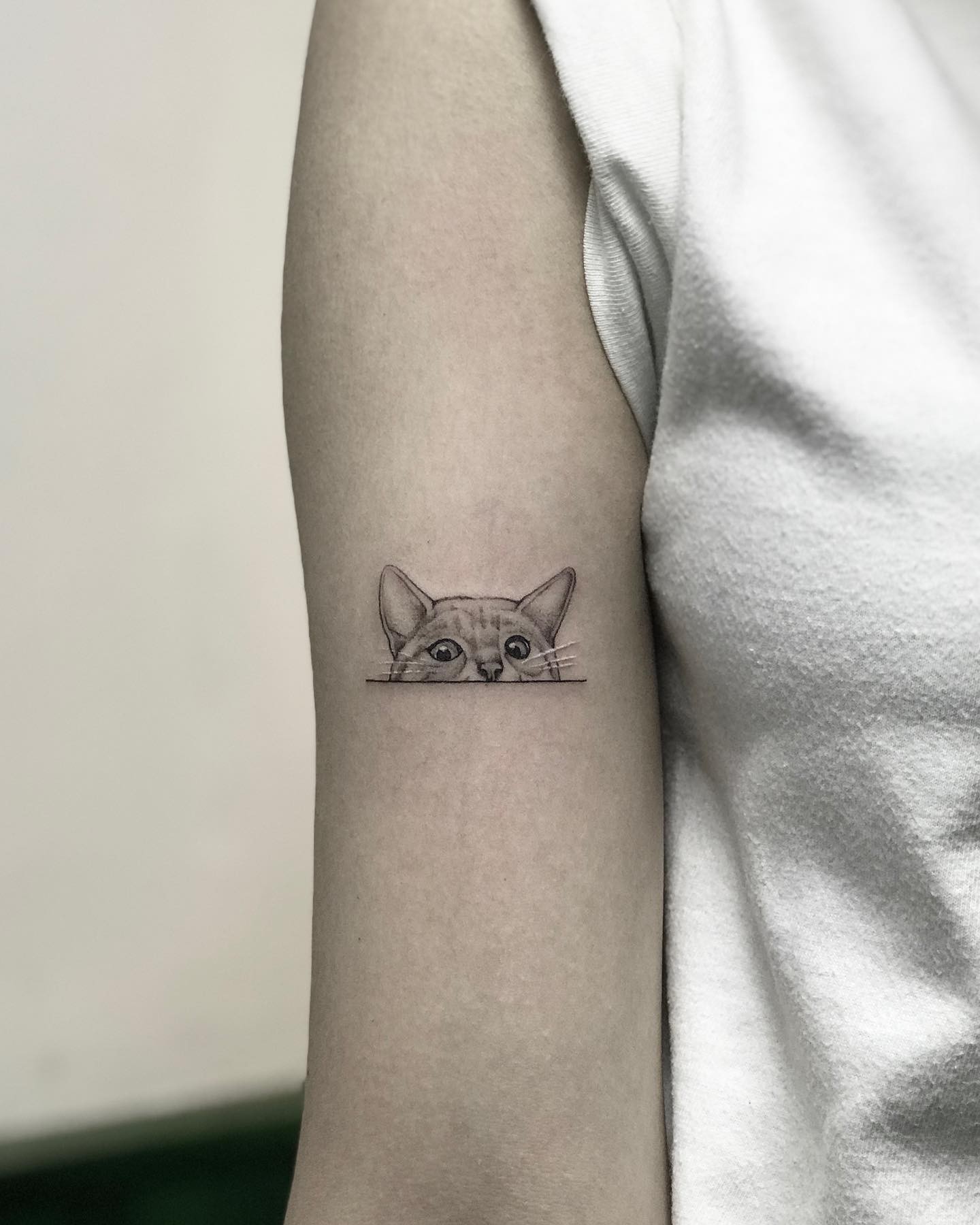 Minimalistic Cat Tattoo