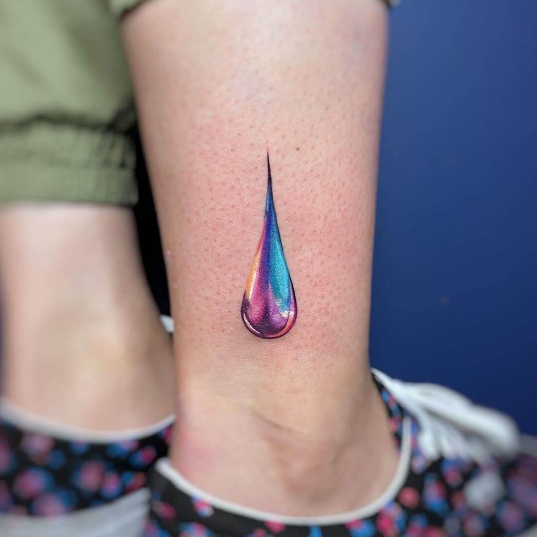 Simple And Colorful Teardrop Tattoo