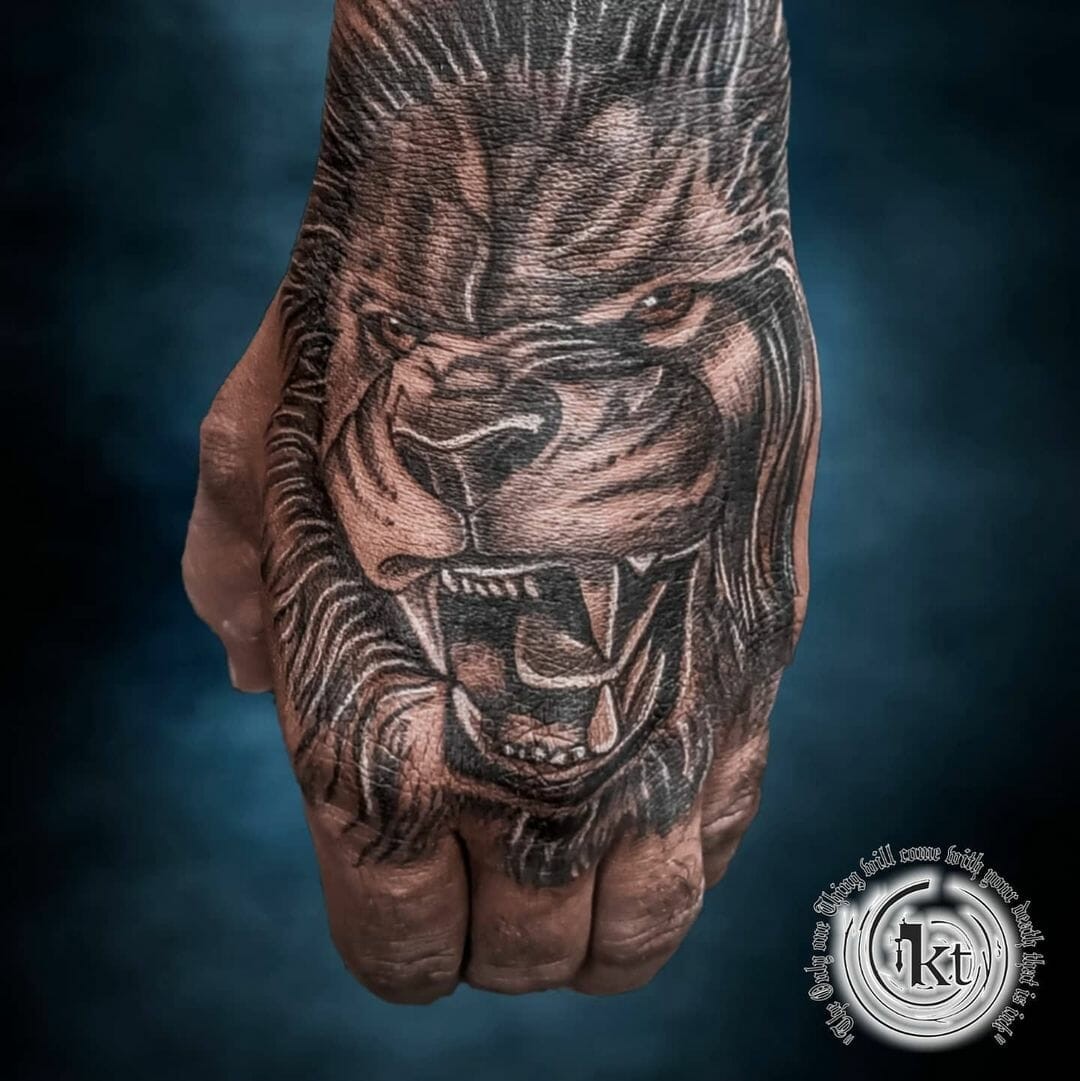 Lion Hand Tattoo