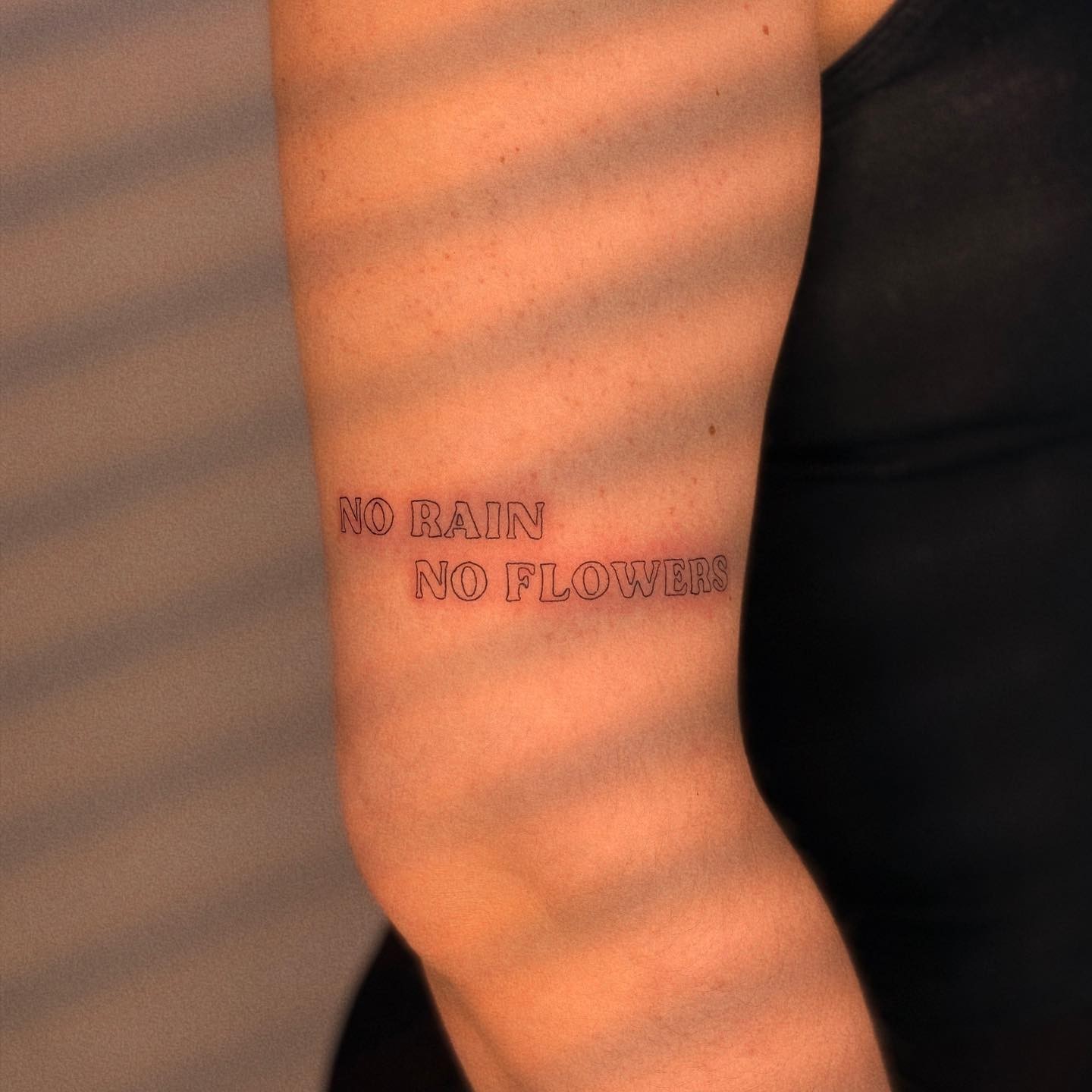 Bold Letters No Rain No Flowers Tattoo