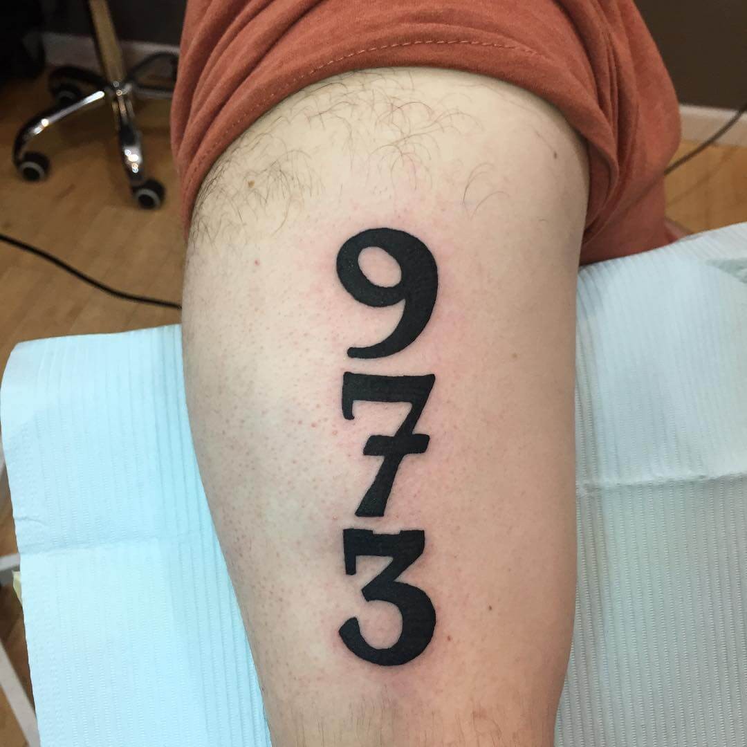 Outer Arm Area Code Tattoo