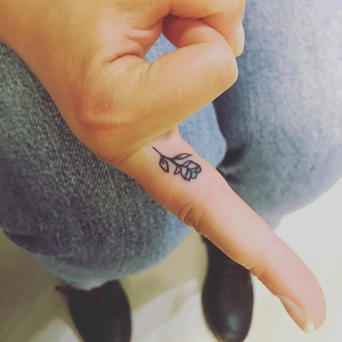 Rose Finger Tattoo