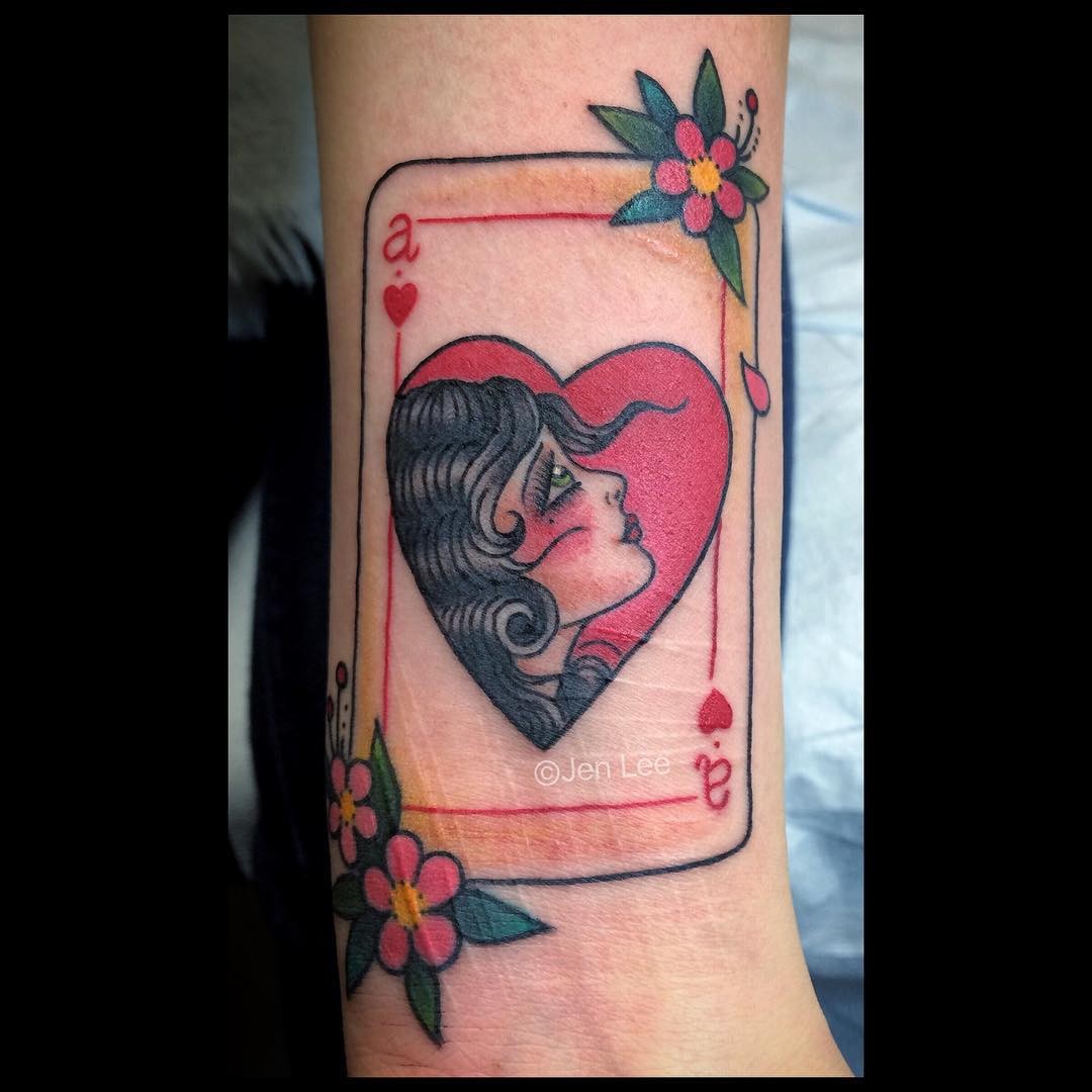 A Tattoo Of Ace Of Hearts With A Woman’s Face