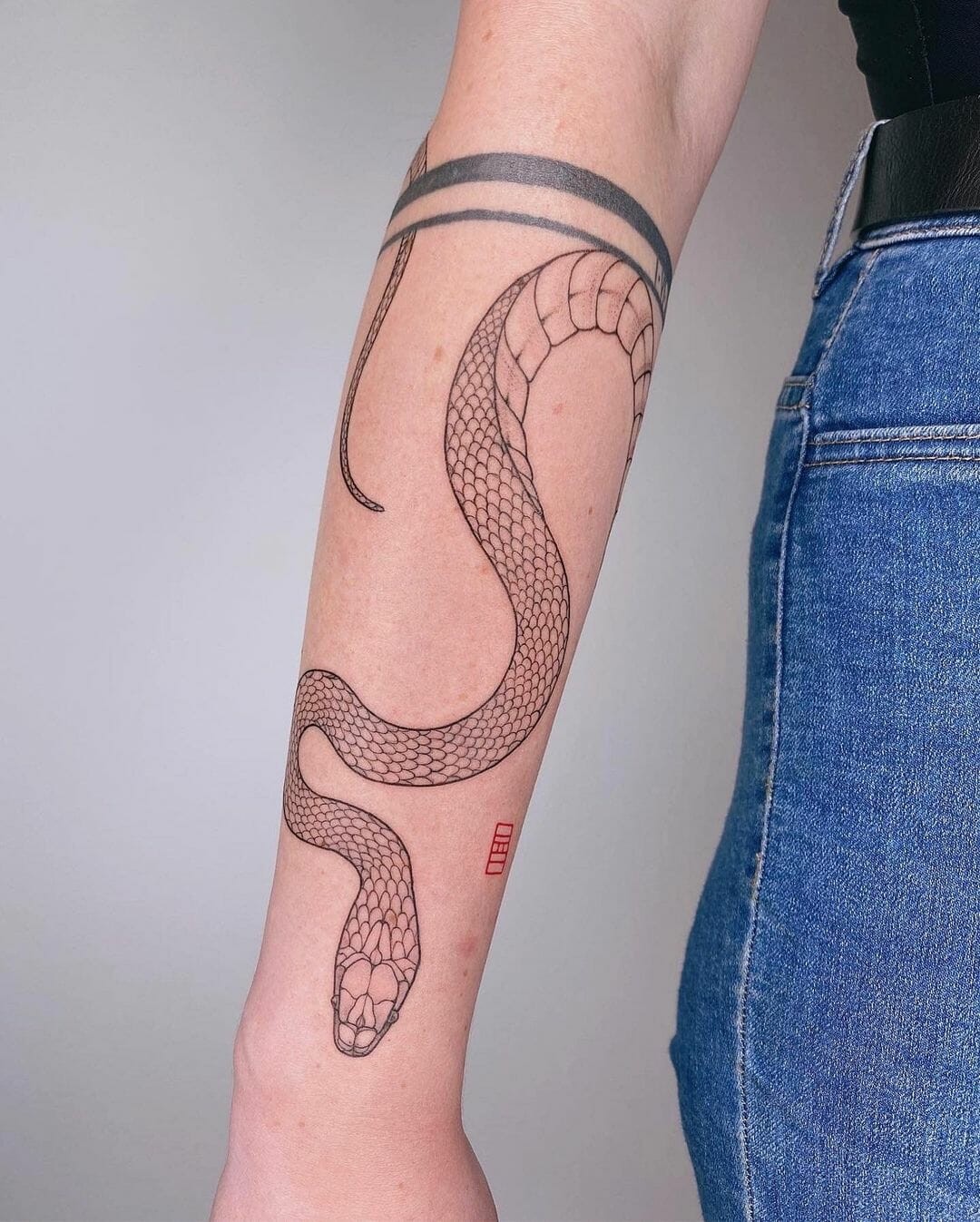 Simplistic Snake Art Tattoo