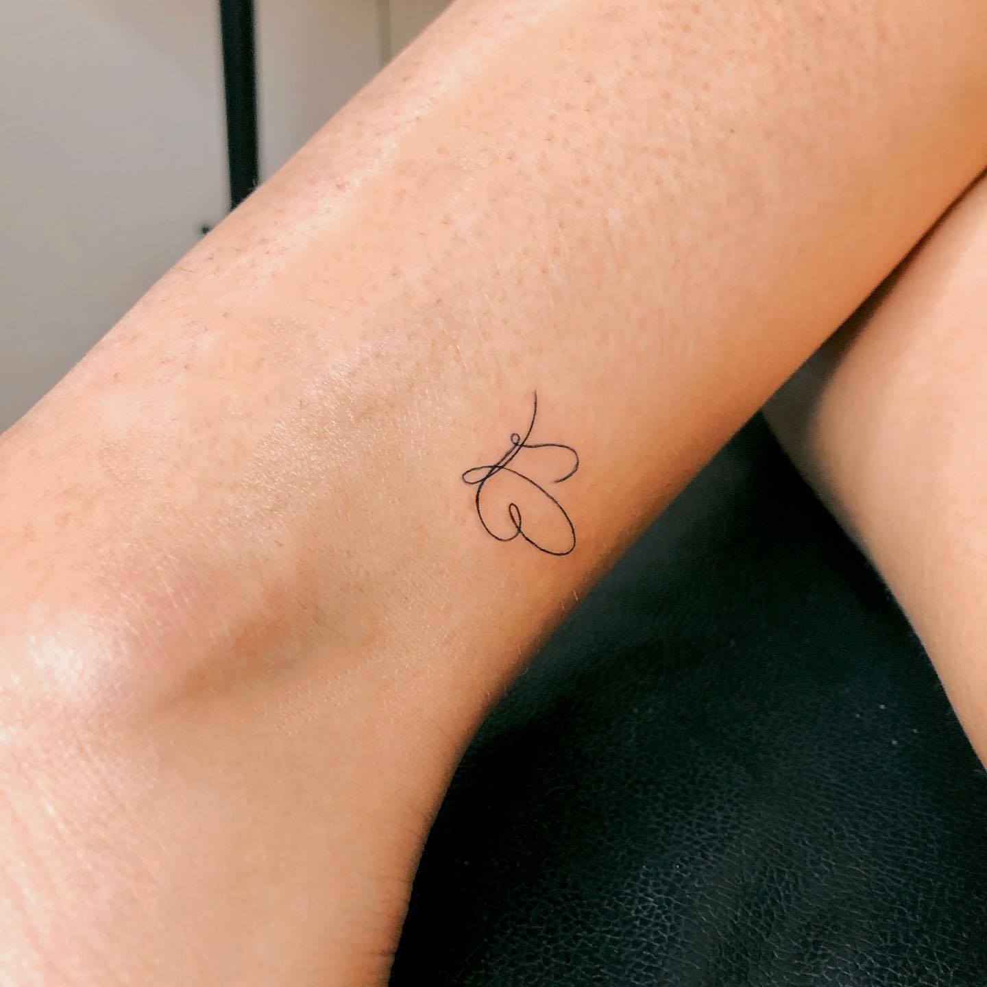 Minimalist Tattoo Of Butterfly Design