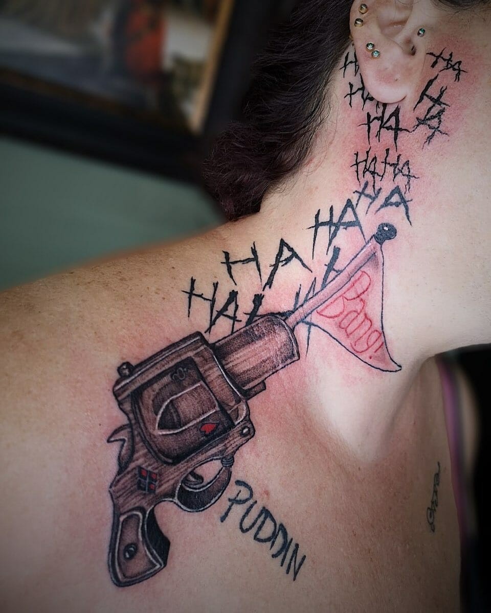 Harley Quinn Pistol Tattoo On Neck