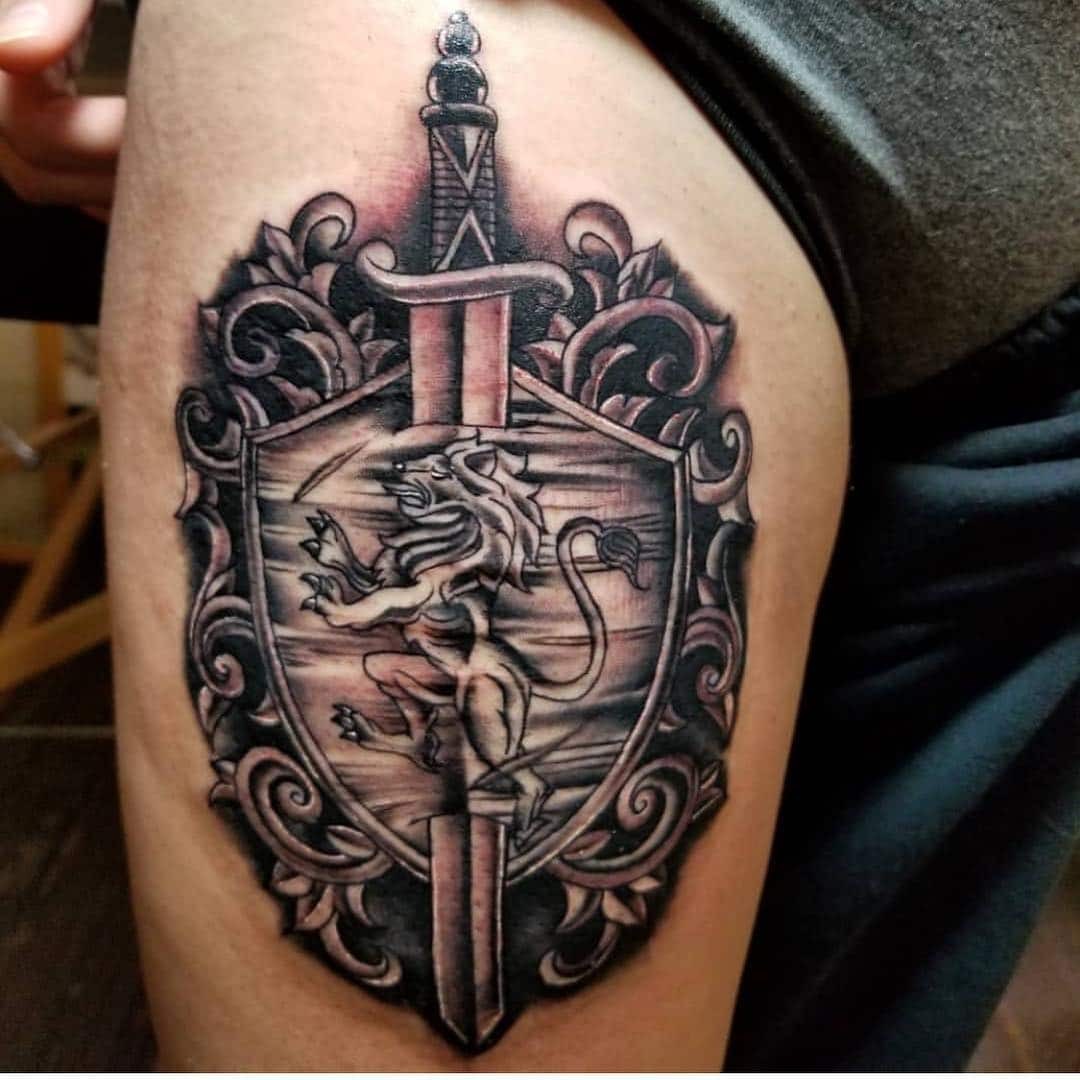 Amazing Lion Shield Tattoo