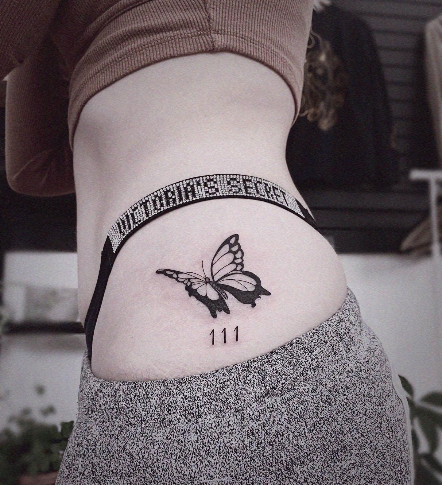 111 Tattoo With A Butterfly