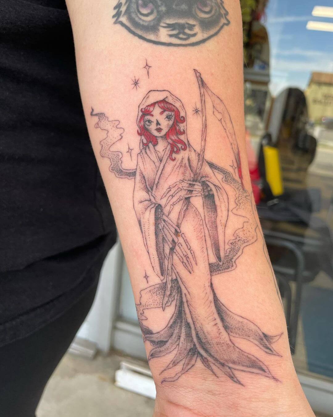 Red-Headed Female Grim Reaper On Forearm