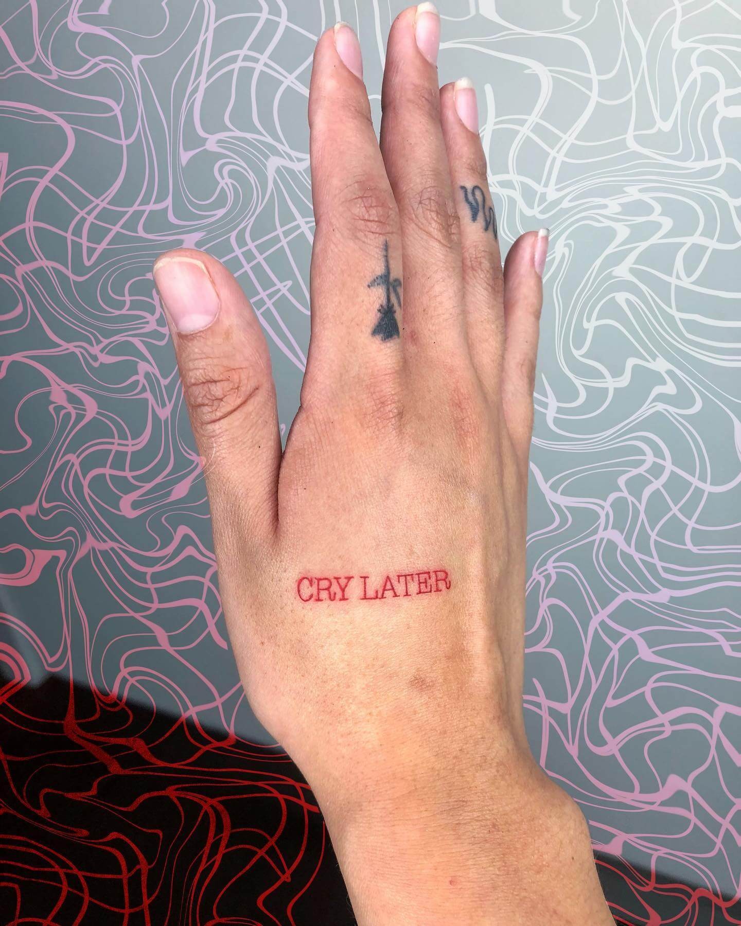 Red Ink Block Letter Tattoo