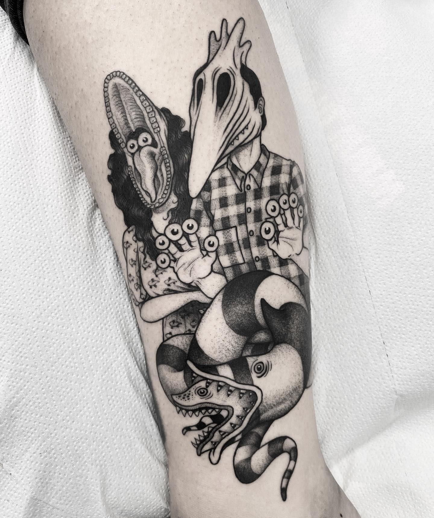 Black Ink Cartoony Male and Female Twist Beetlejuice Sandworm Tattoo Art