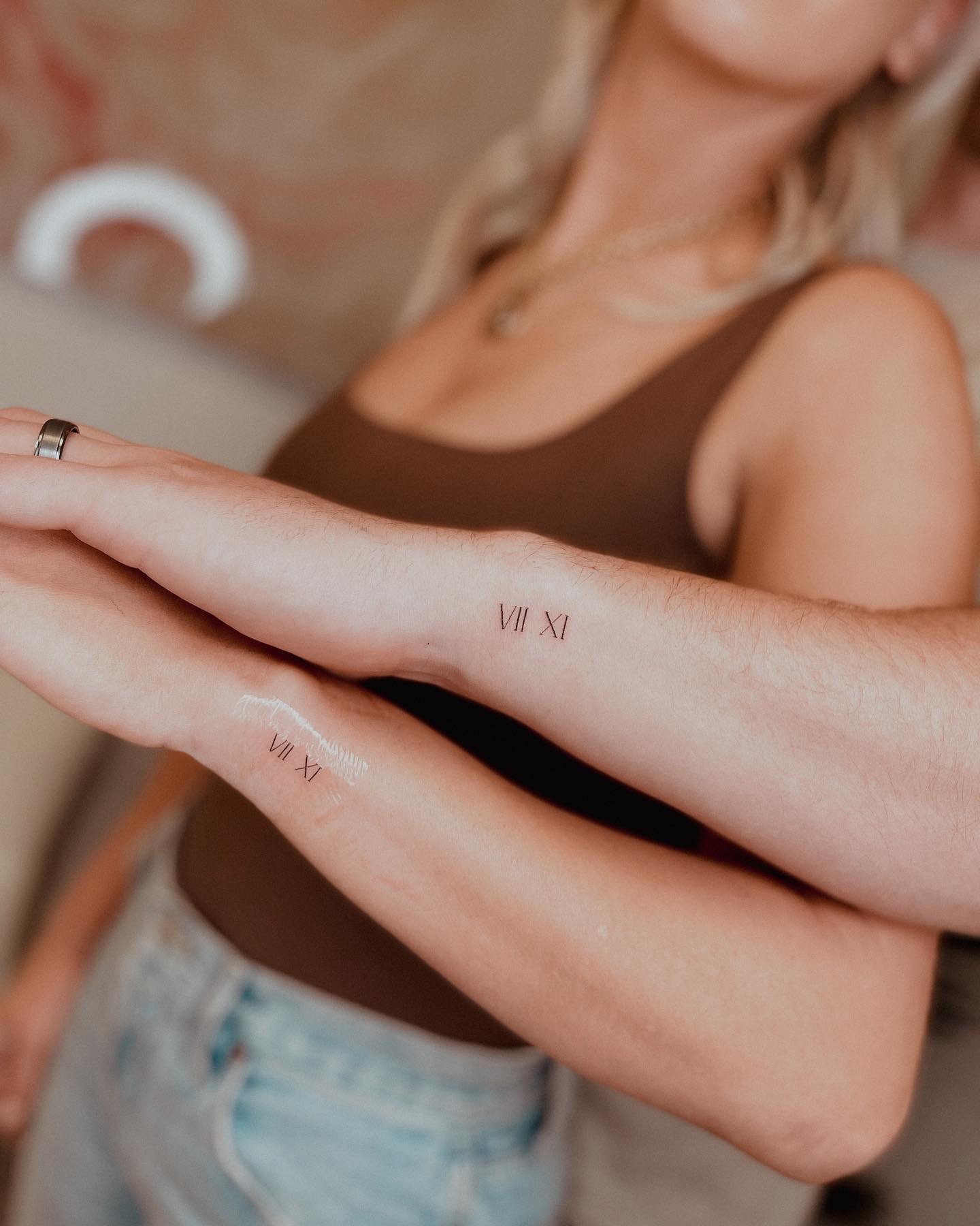 Dainty Roman Numeral Tattoos On Wrist