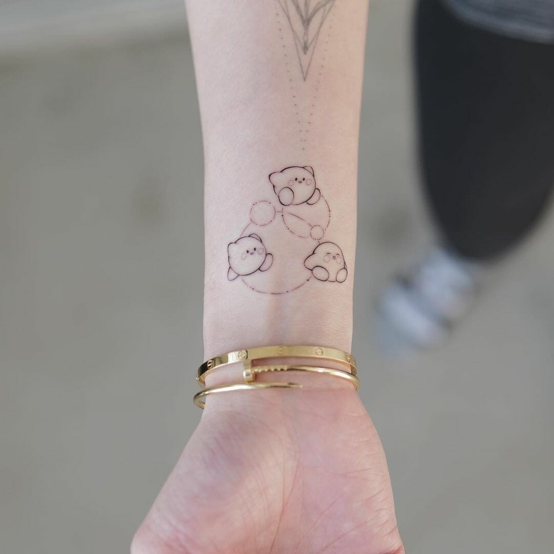 Simple Kirby Tattoo On Wrist