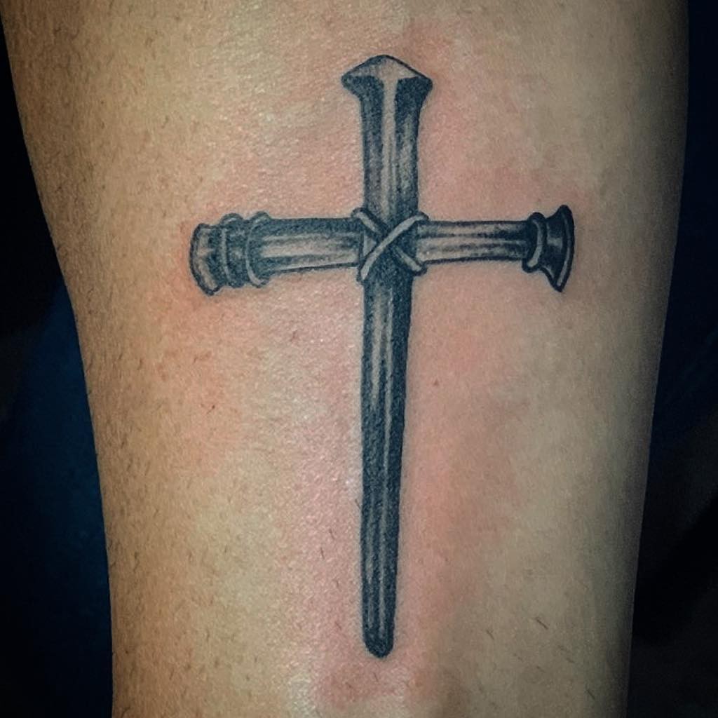 Black Ink Stylish Nail Cross Tattoo Design