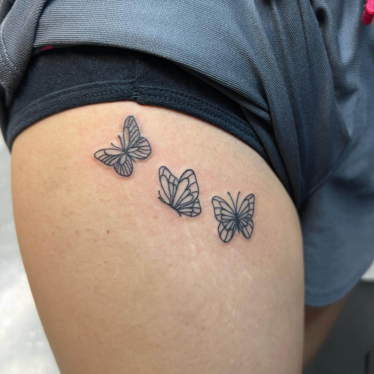 Minimalistic Small Butterfly Tattoo