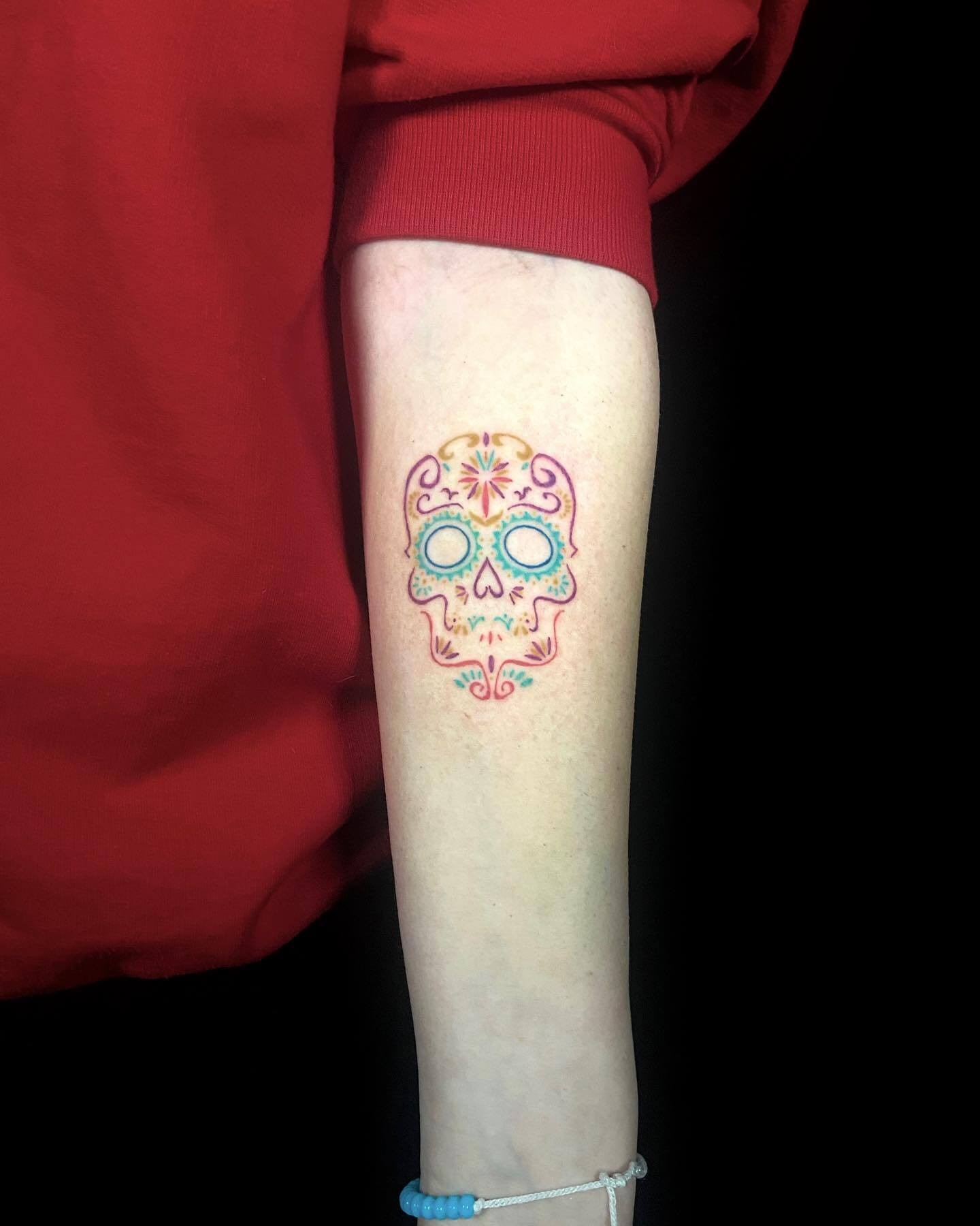 Feminine Small Sugar Skull Tattoo