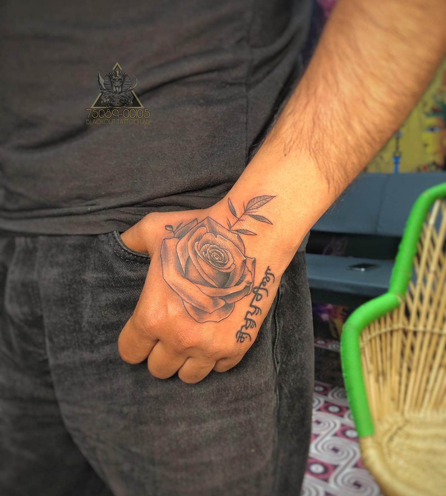 Classic Black Rose Hand Tattoo With Leaves