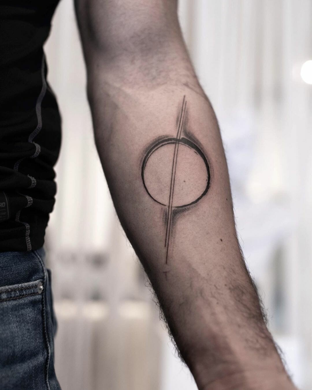 Simple Black Hole Tattoo