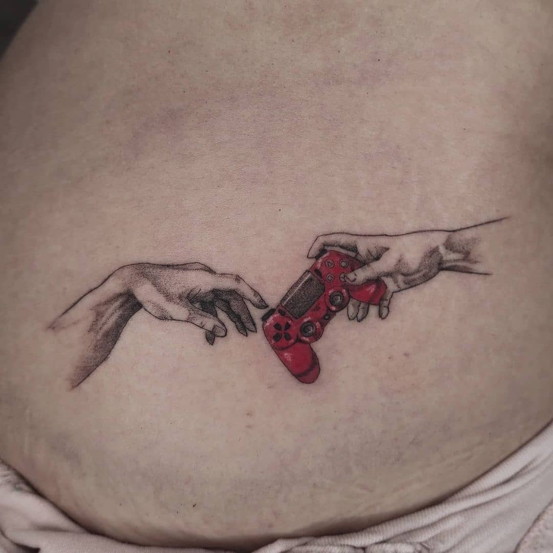 Artistic Playstation Tattoo