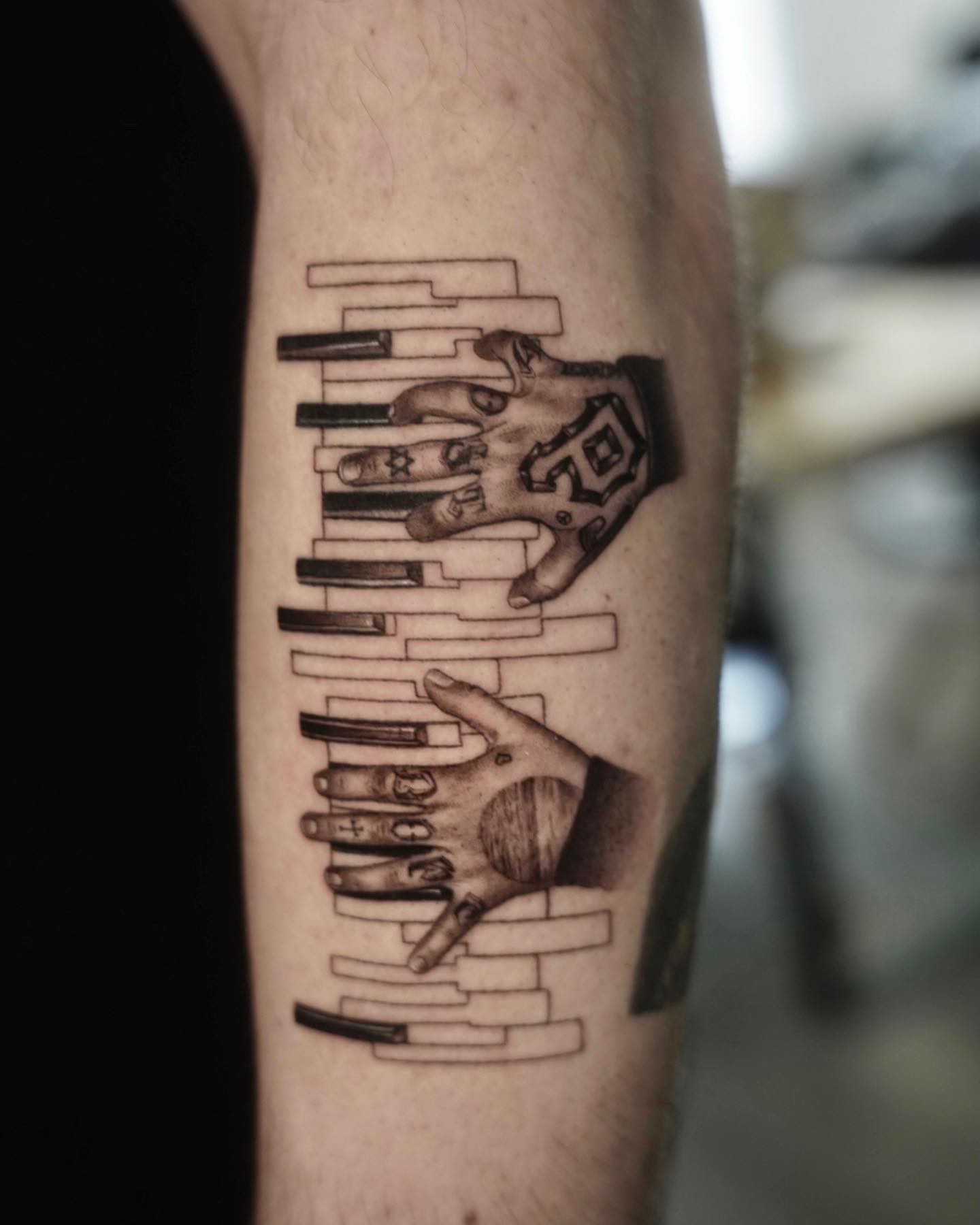 Two Hands Playing The Piano Tattoo