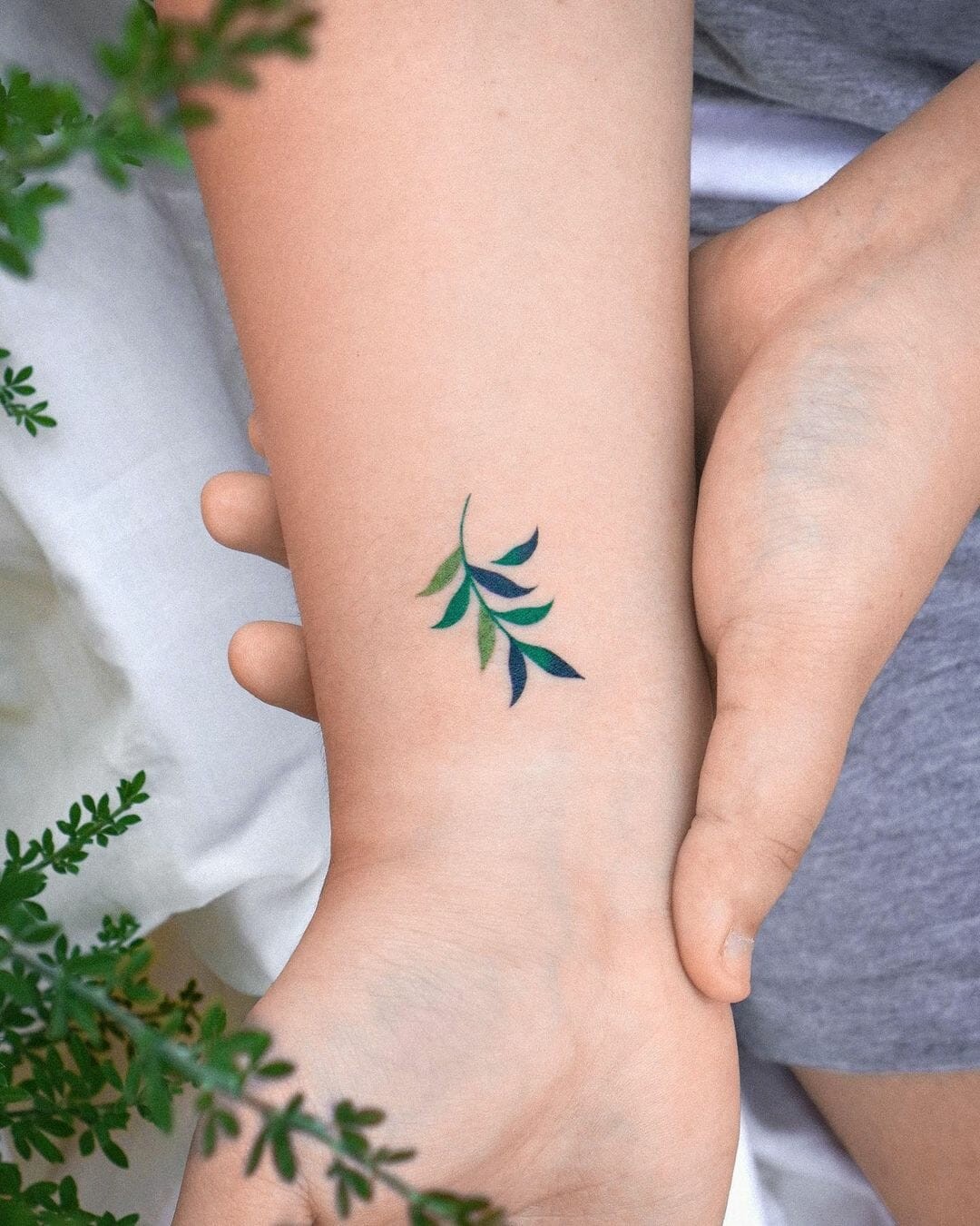 Miniature Green Leaf Tattoo