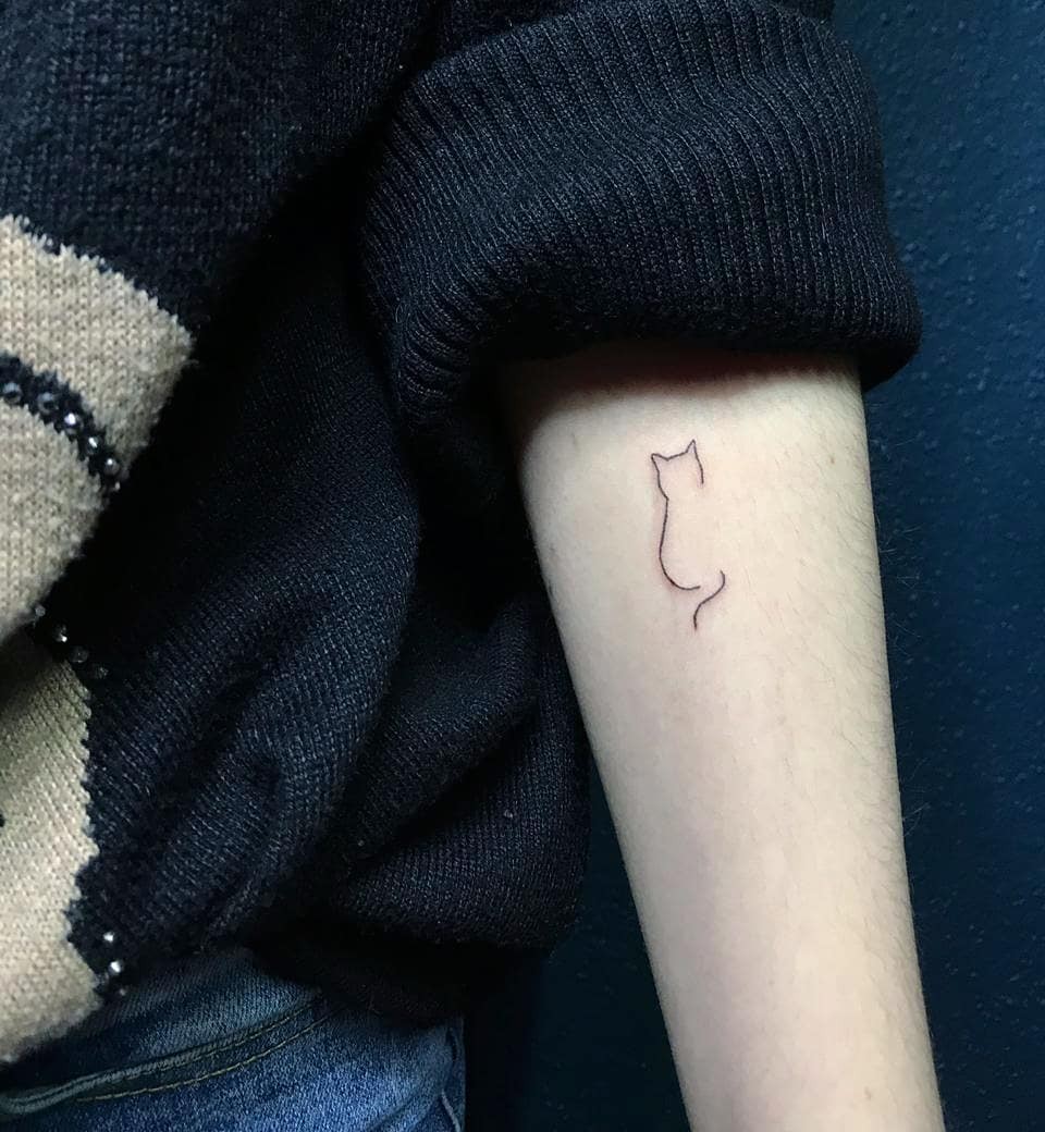 Minimalist Cat Outline Tattoo