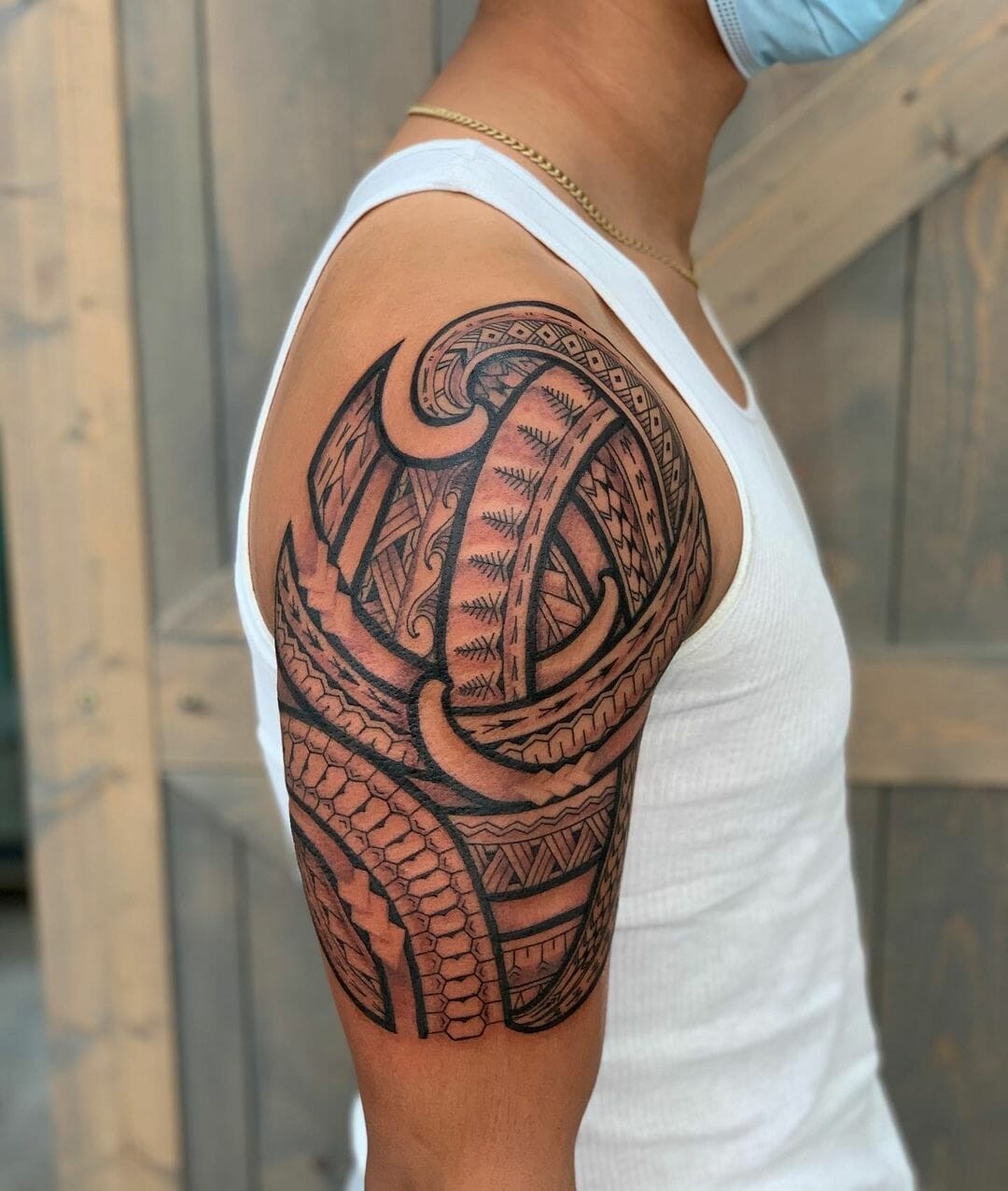 Half-Sleeve Filipino Tribal Tattoo