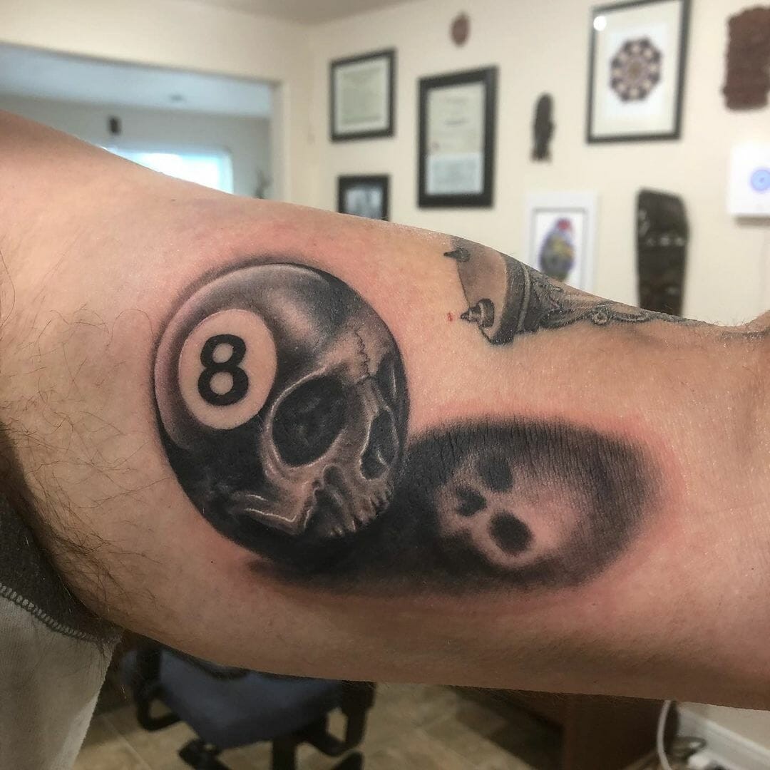 Spectacular 8 Ball Tattoo With A Skull