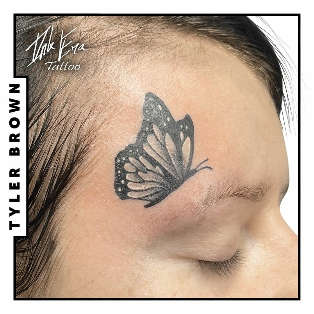 Woman Butterfly Face Tattoo