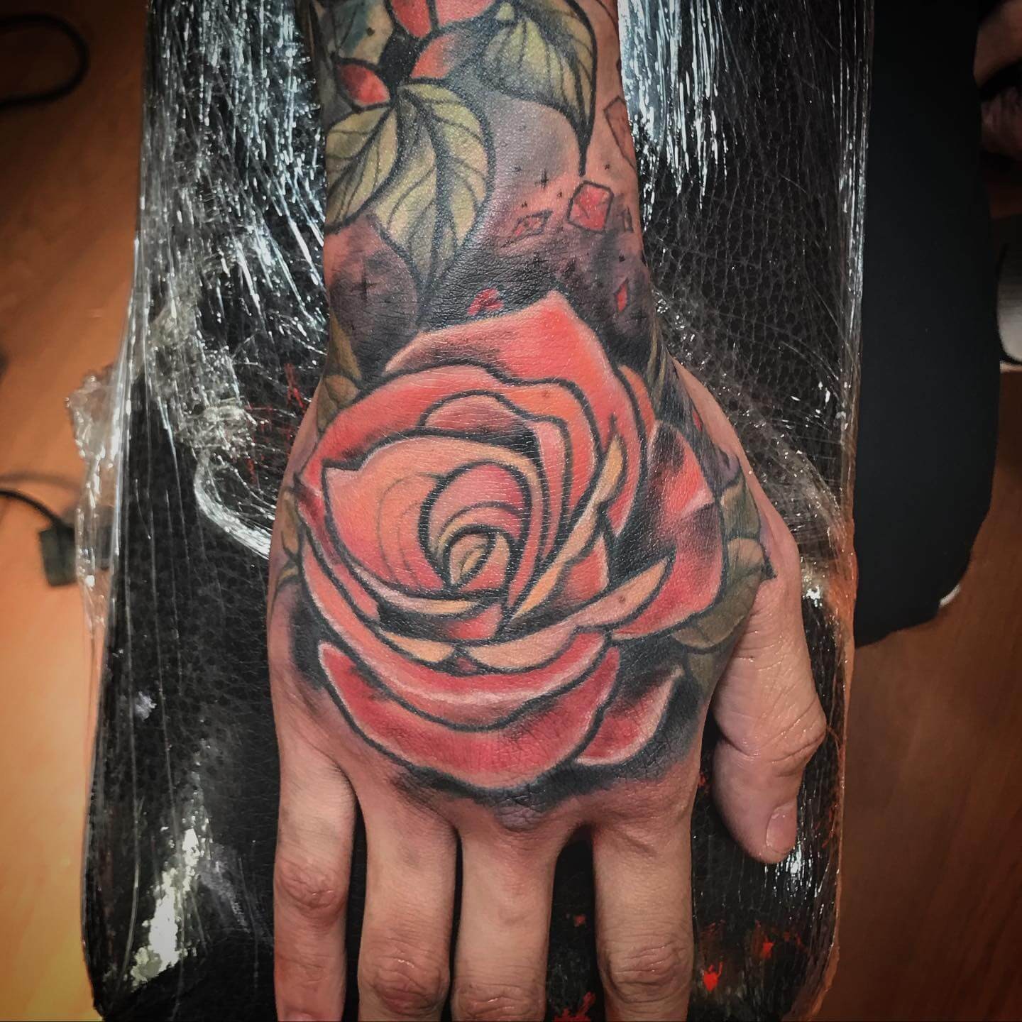 Beautiful Full Color Big Rose Hand Tattoo