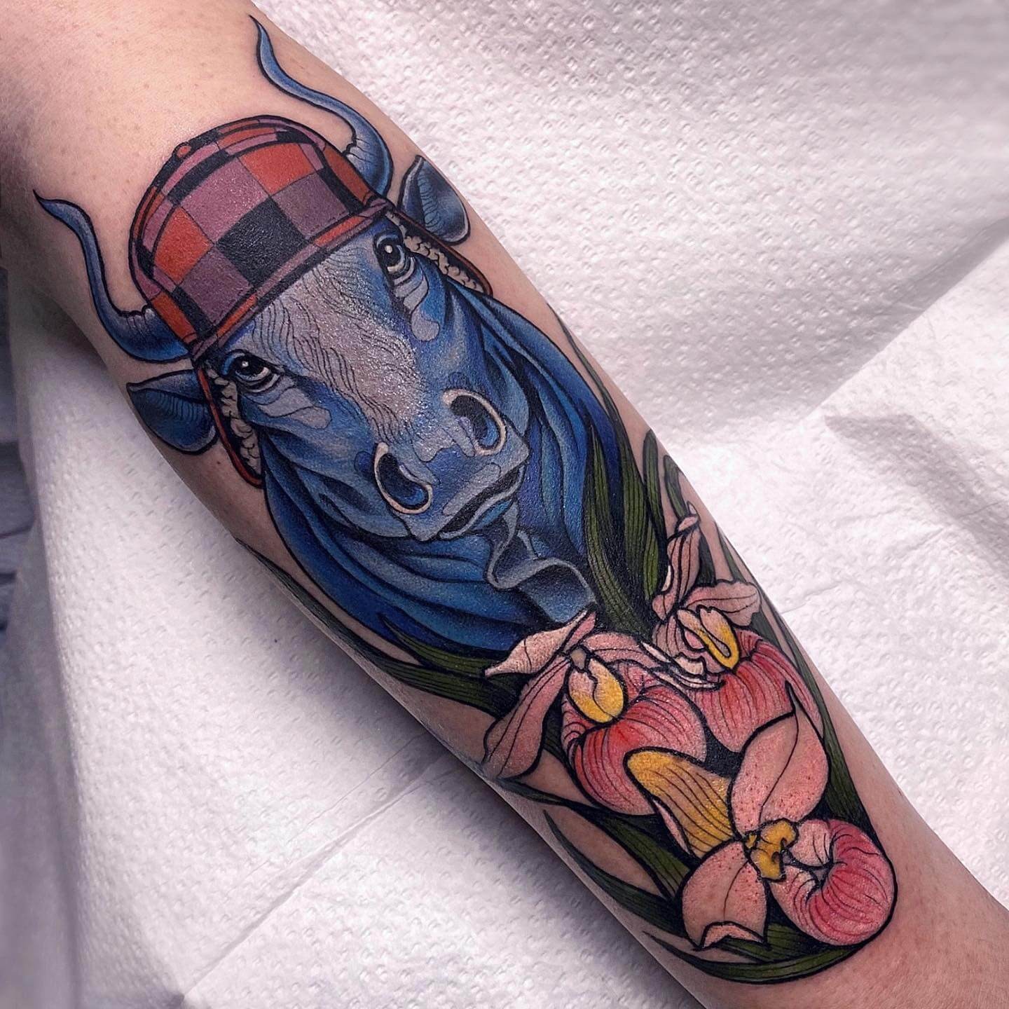 Vibrant Blue Ox Tattoo Designs