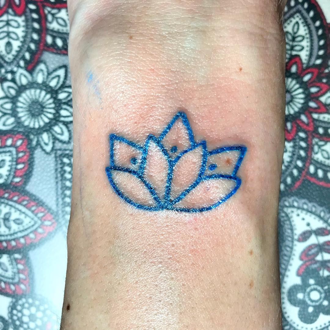 Simple Blue Ink Lotus Flower Tattoo