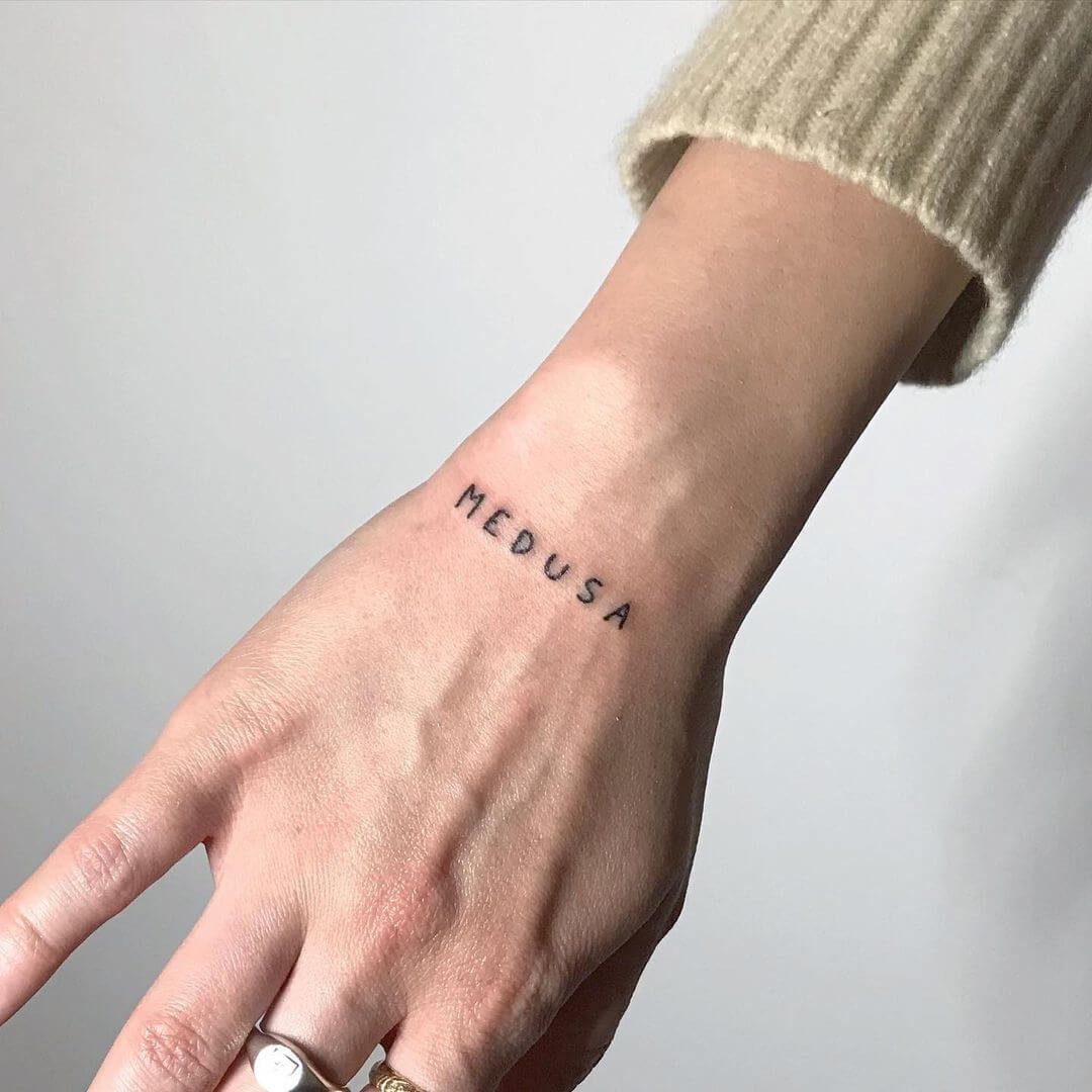 One Word Wrist Tattoos For Women