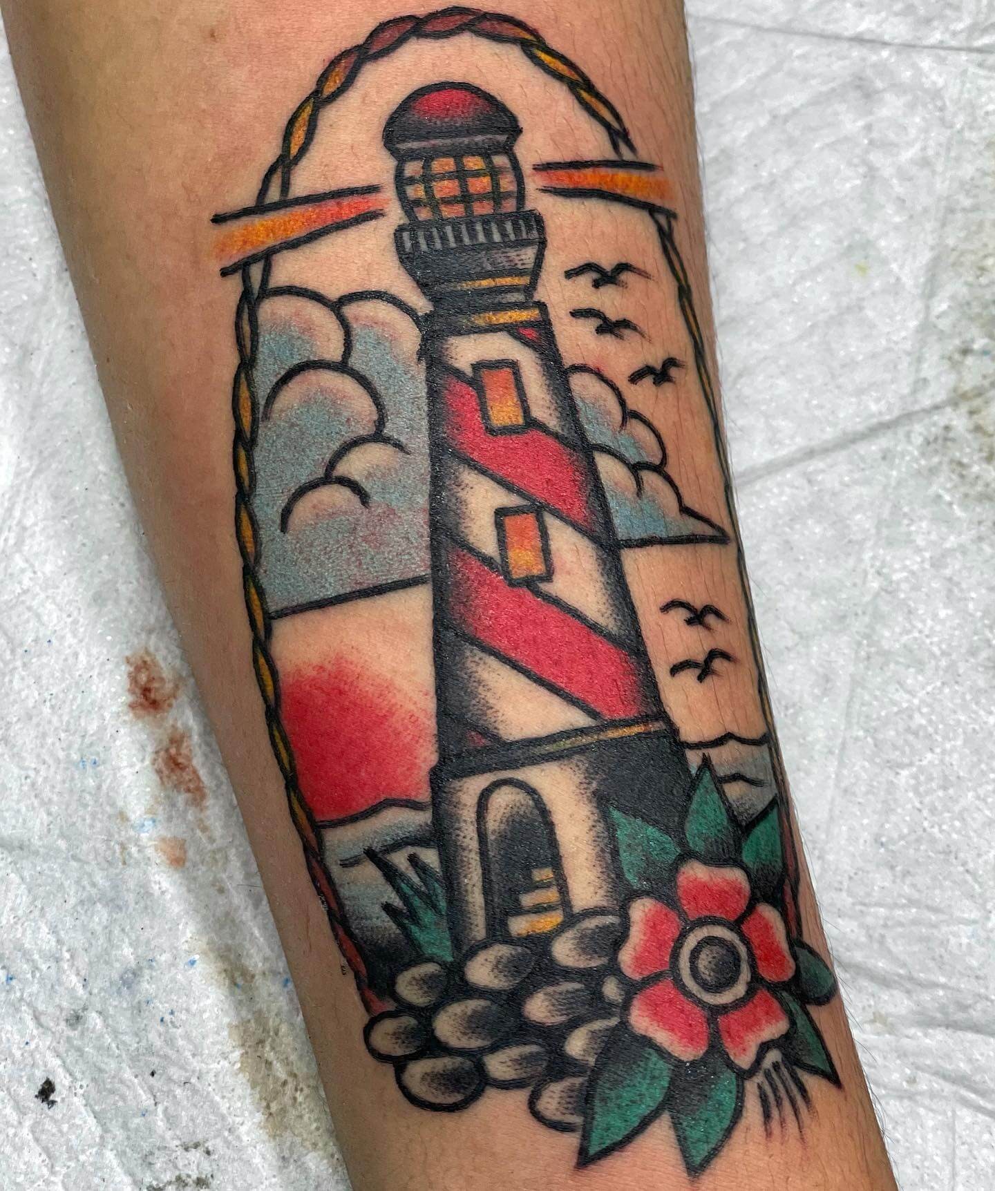 Jazzy Traditional American Lighthouse Tattoo