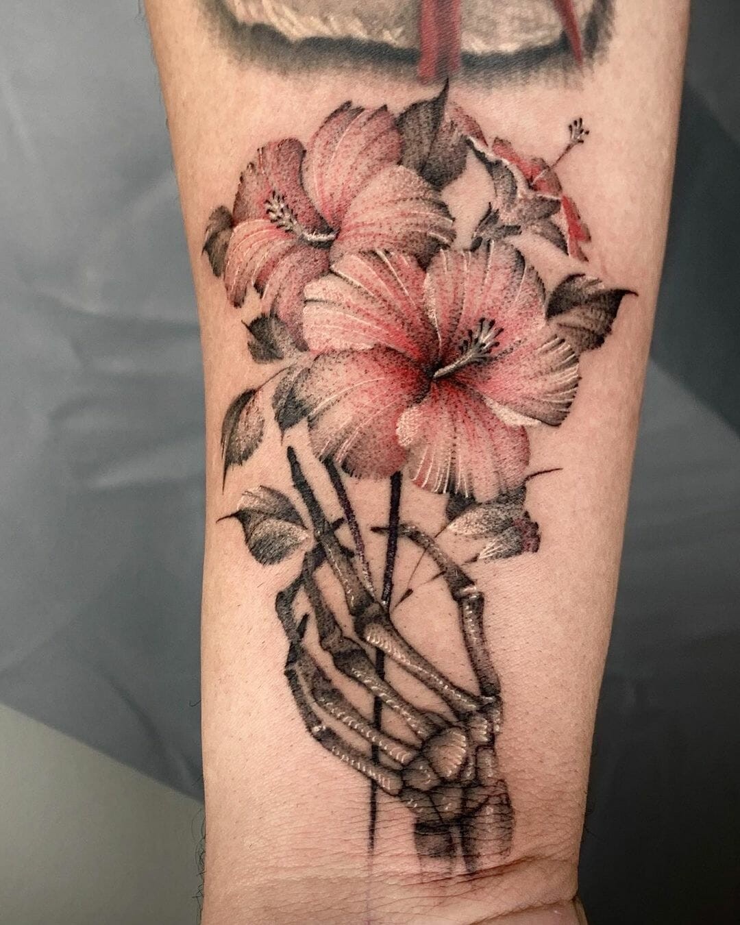 The Skeleton And Hibiscus Tattoo