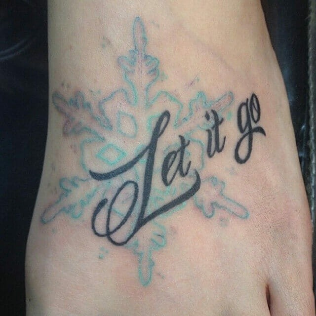 Let It Go Disney’ Frozen’-Themed Tattoo With Faded Snowflake