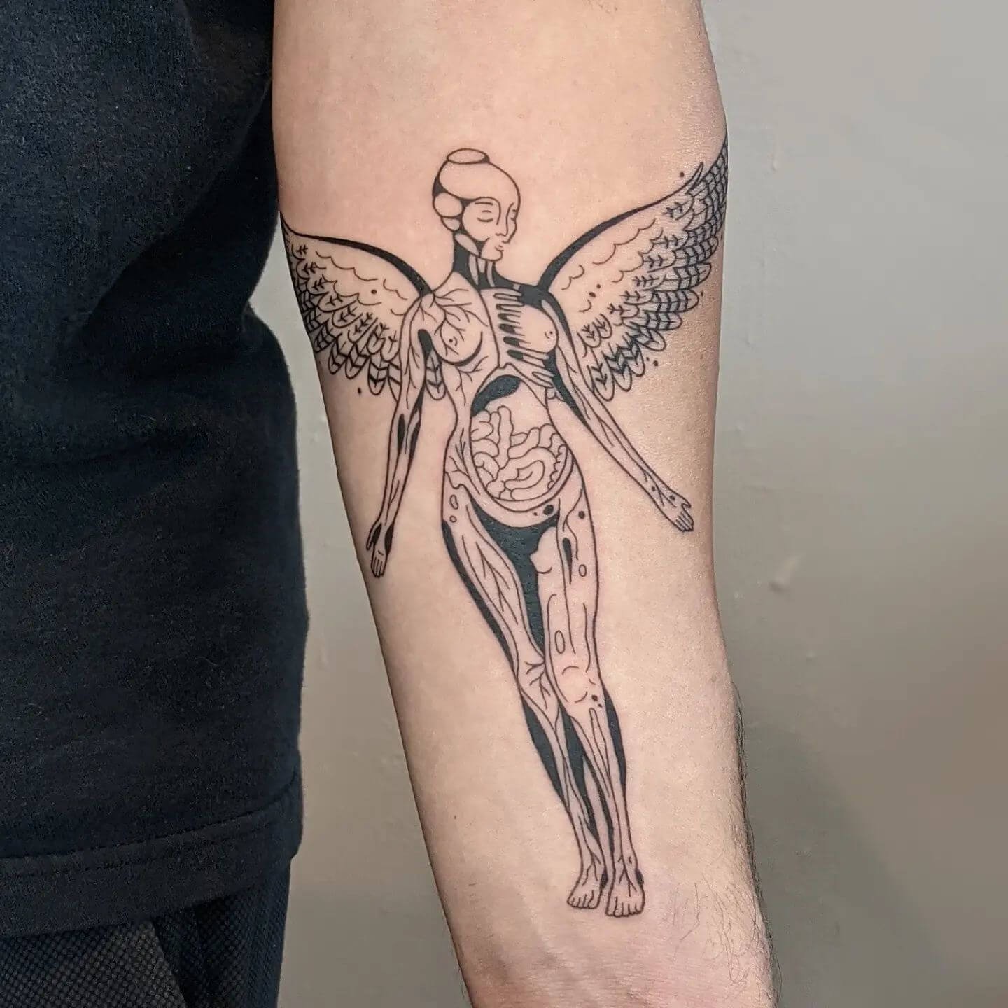 In Utero Black And White Stencil Tattoo