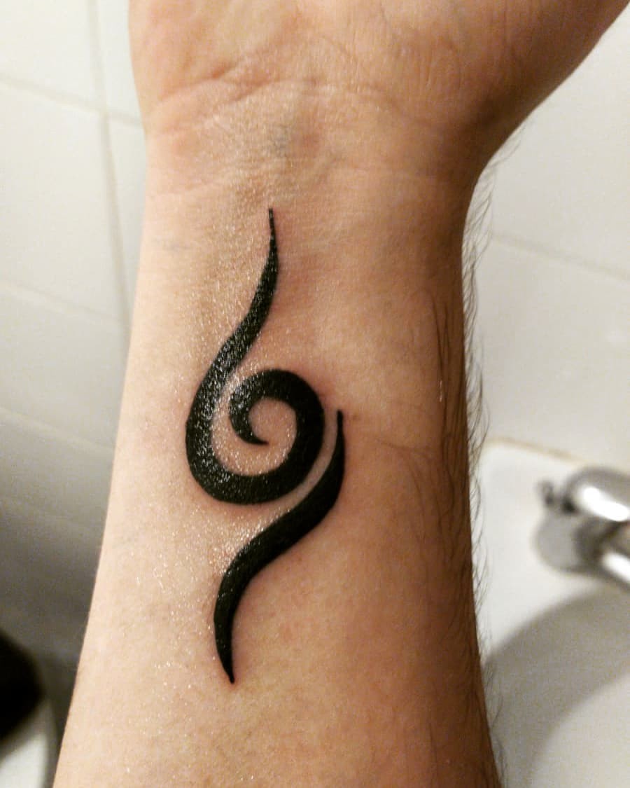 A Simple Blackwork Tattoo That Is Small Yet Powerful