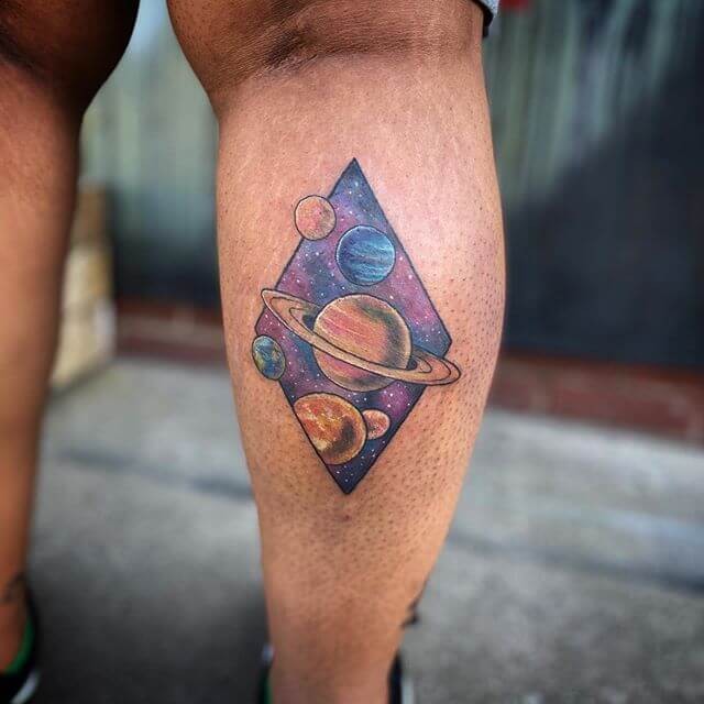 Colorful Space And Planet Saturn Tattoo Piece On Arm Sleeve Design