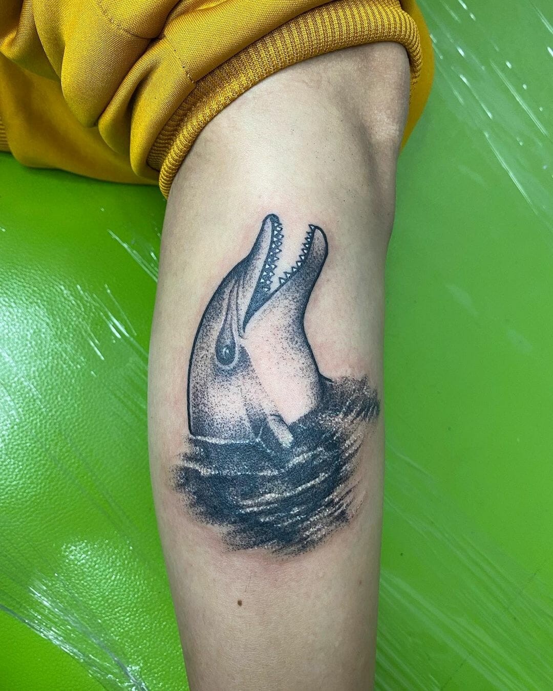 Dolphins Peeping from Water Tattoo