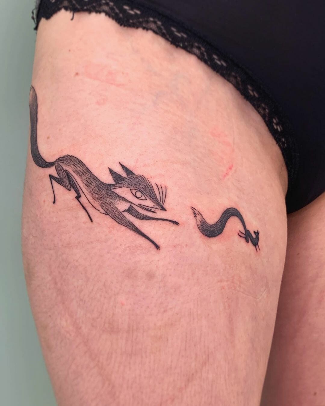 Fox Chasing Squirrel Tattoo