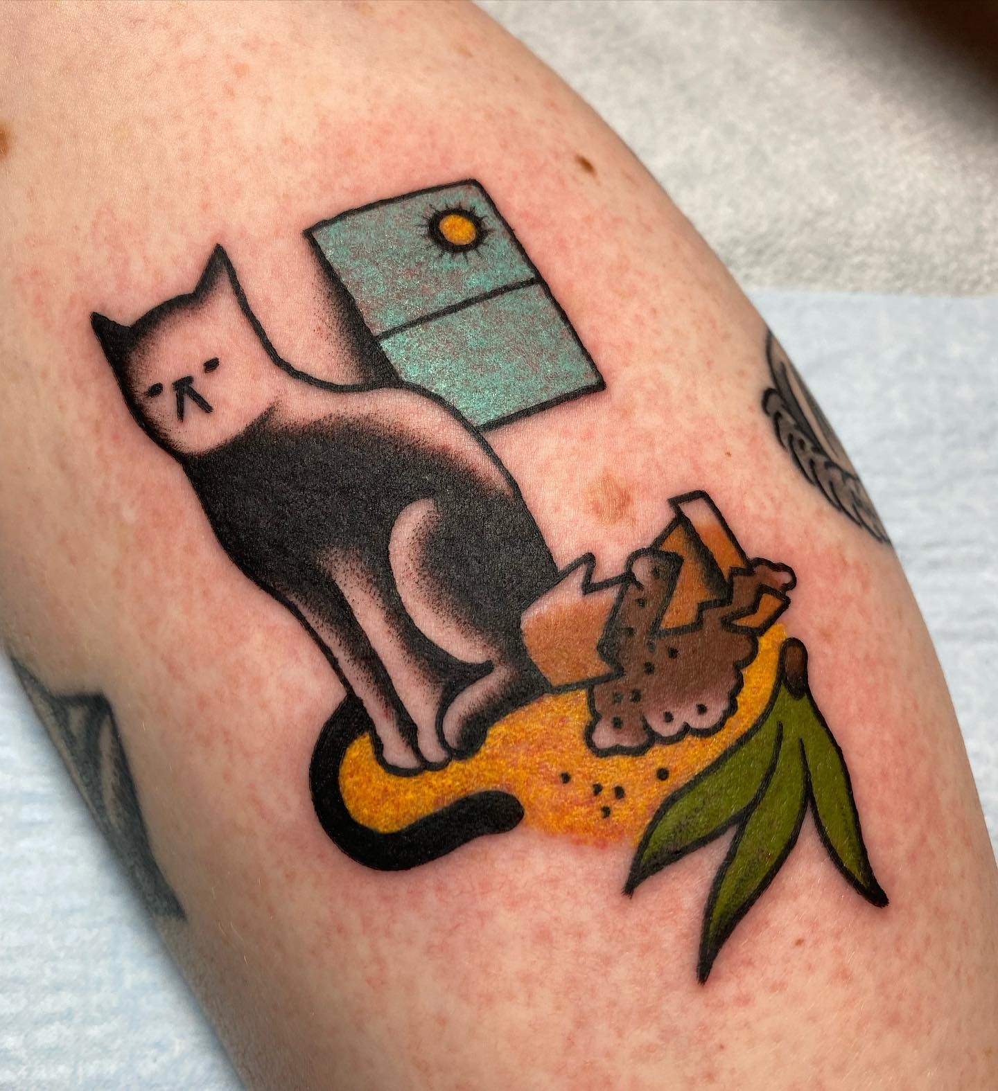 The Mischievous Black Cat Tattoo