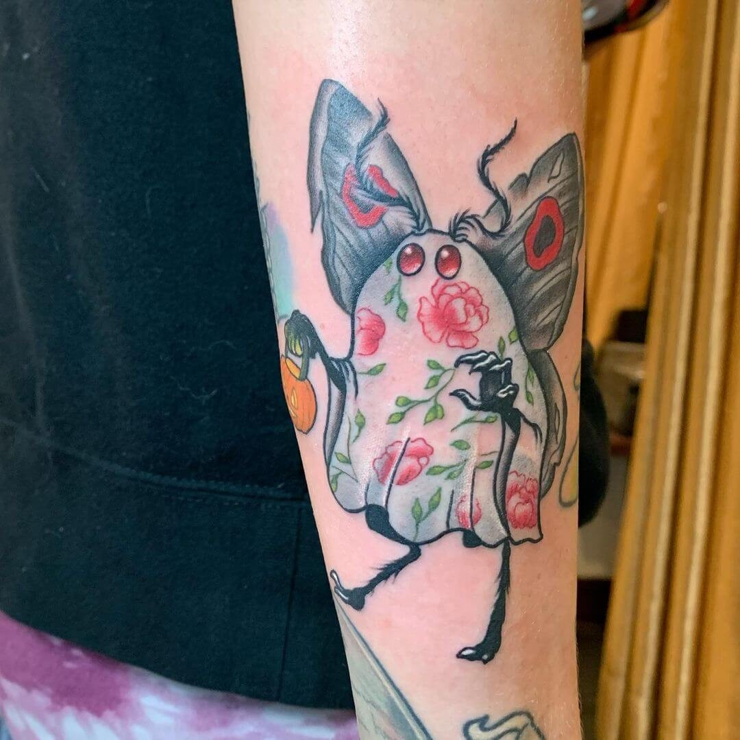 Cartoonish Small Mothman Tattoo