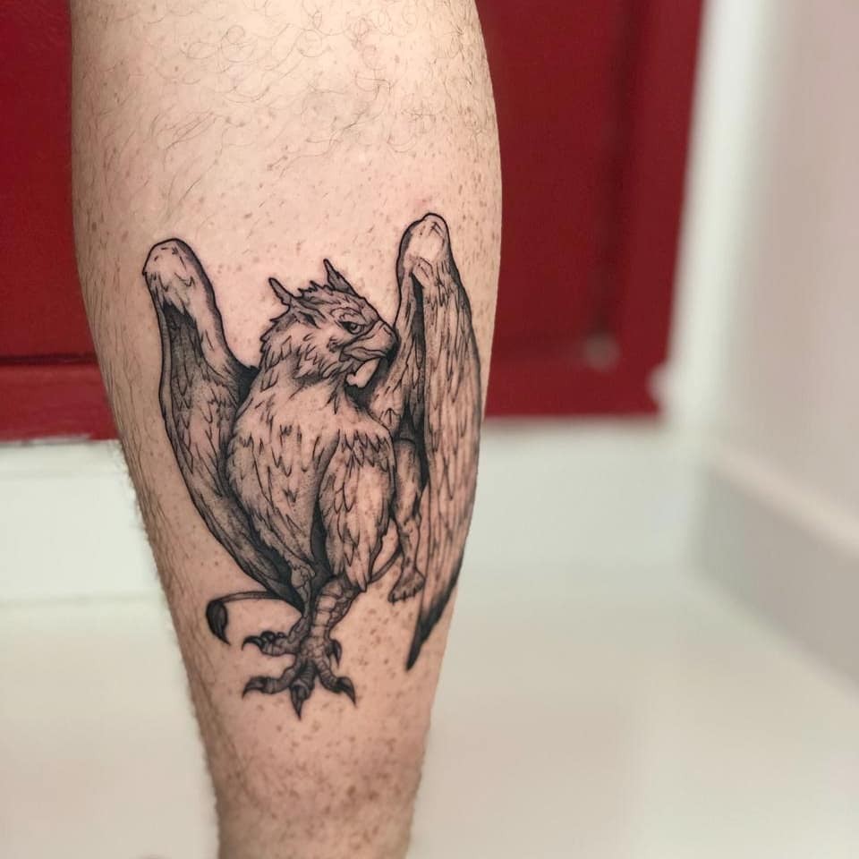 Small Griffin Tattoo Over Calf