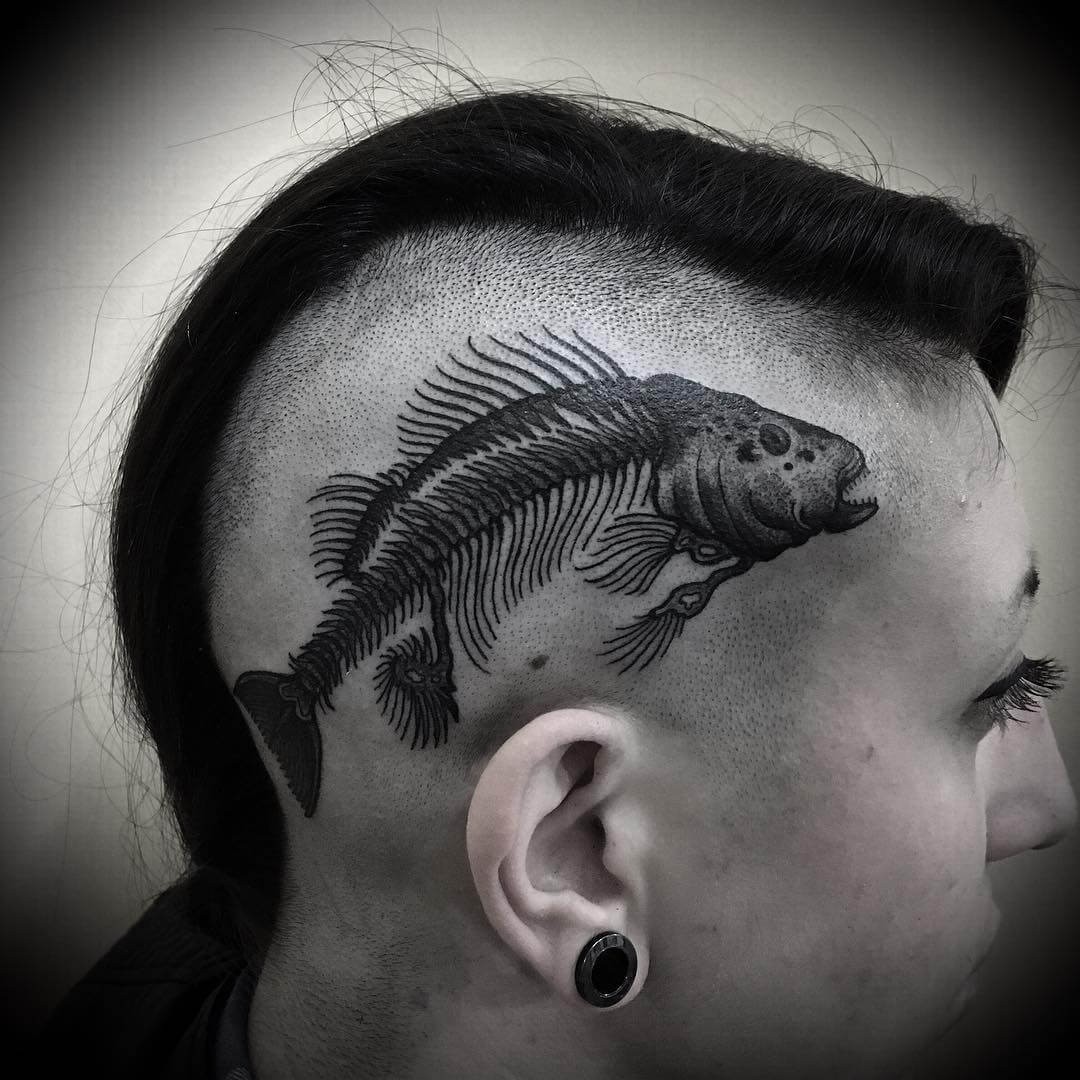 The Striking Fish Skeleton Head Tattoo