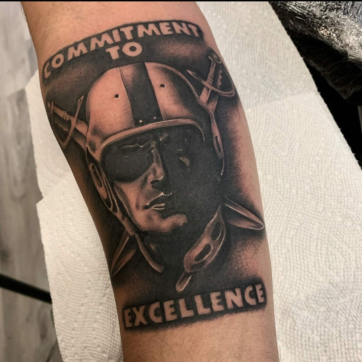 Hyper-realistic Raiders Tattoo