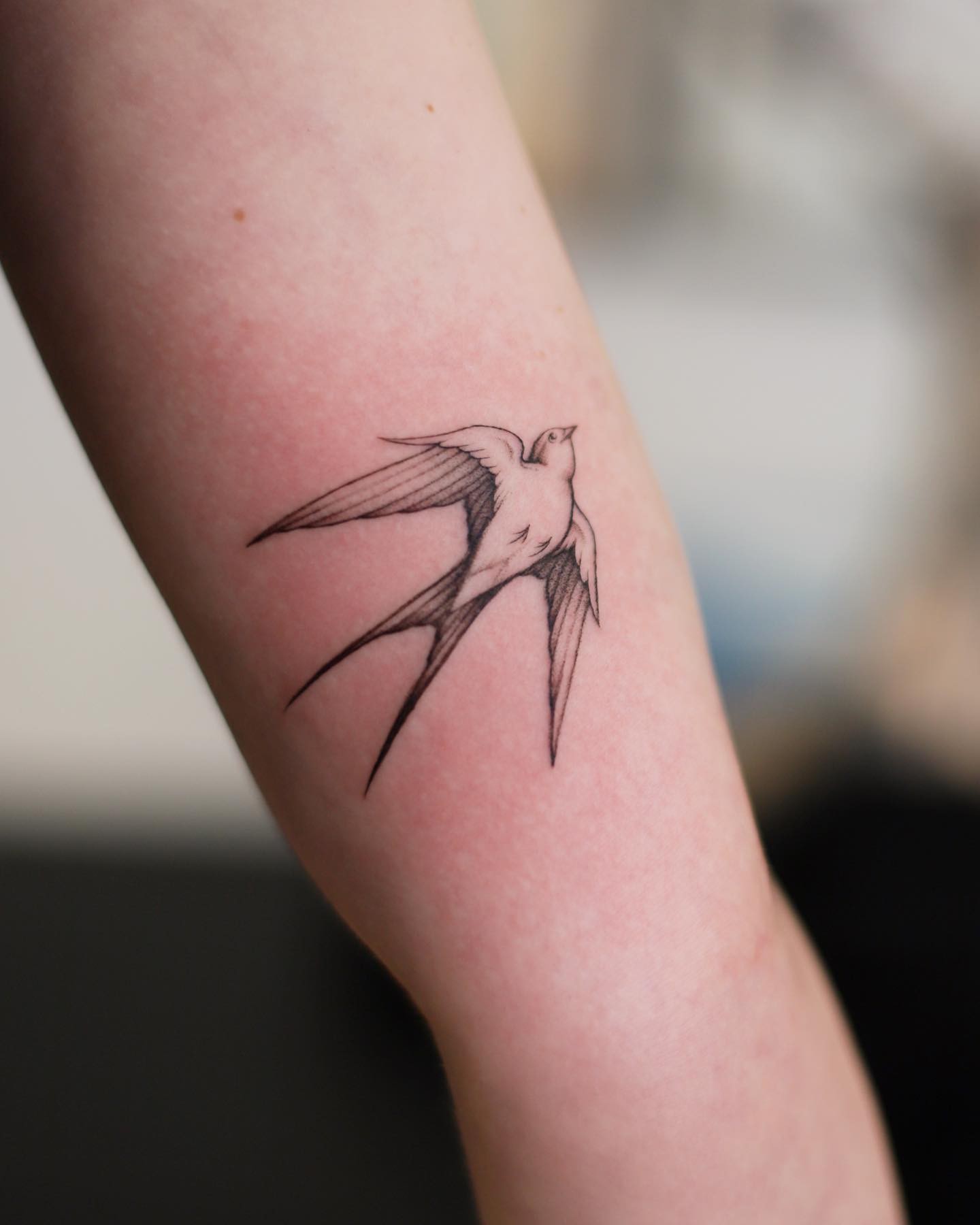 Minimal Swallow Hand Tattoo