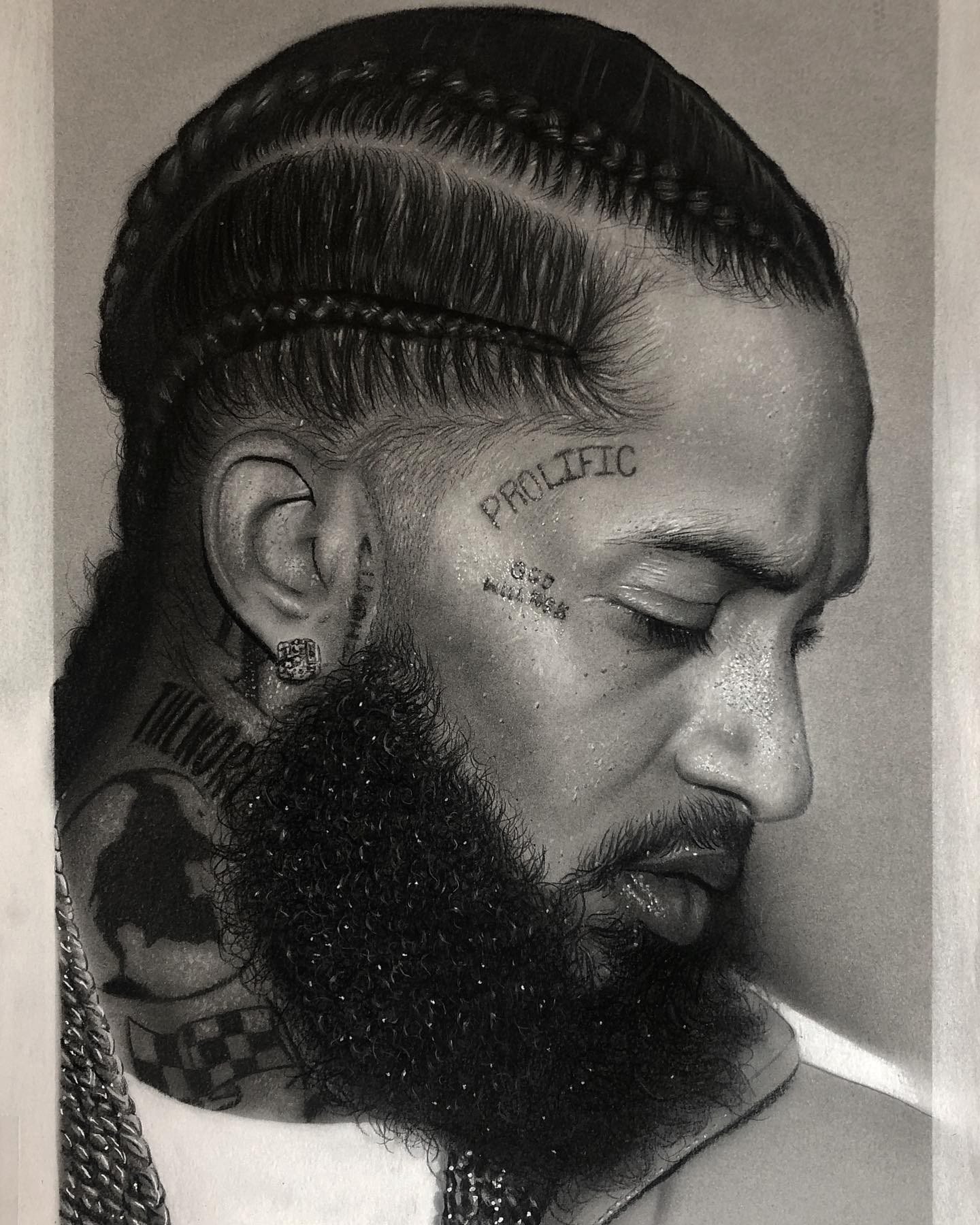 Nipsey Hussle Prolific Tattoo