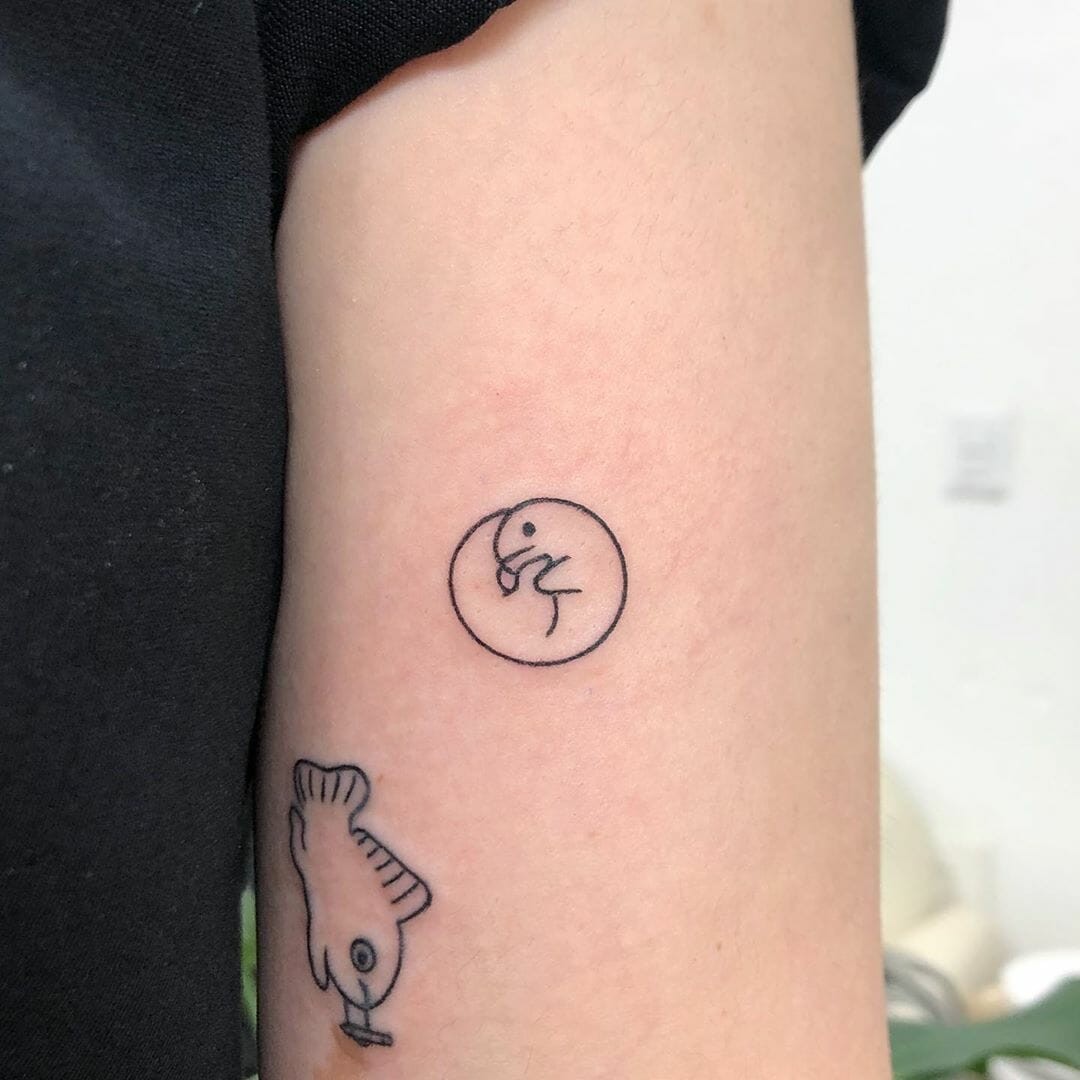 Tiny Dinosaur Tattoo