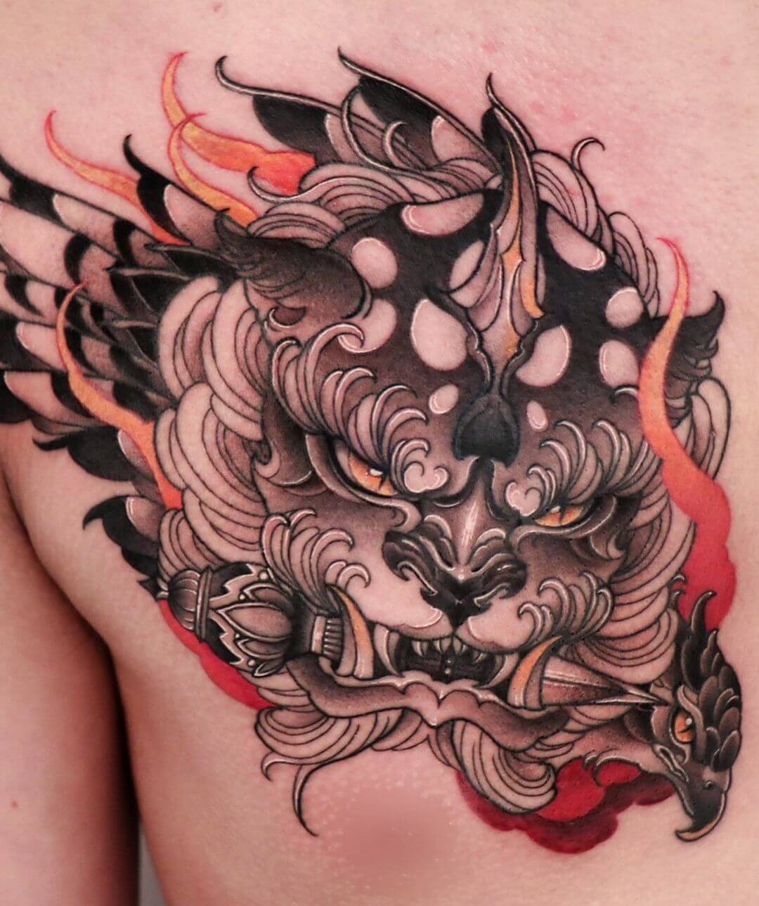 Fierce Foo Dogs With Dagger Tattoo